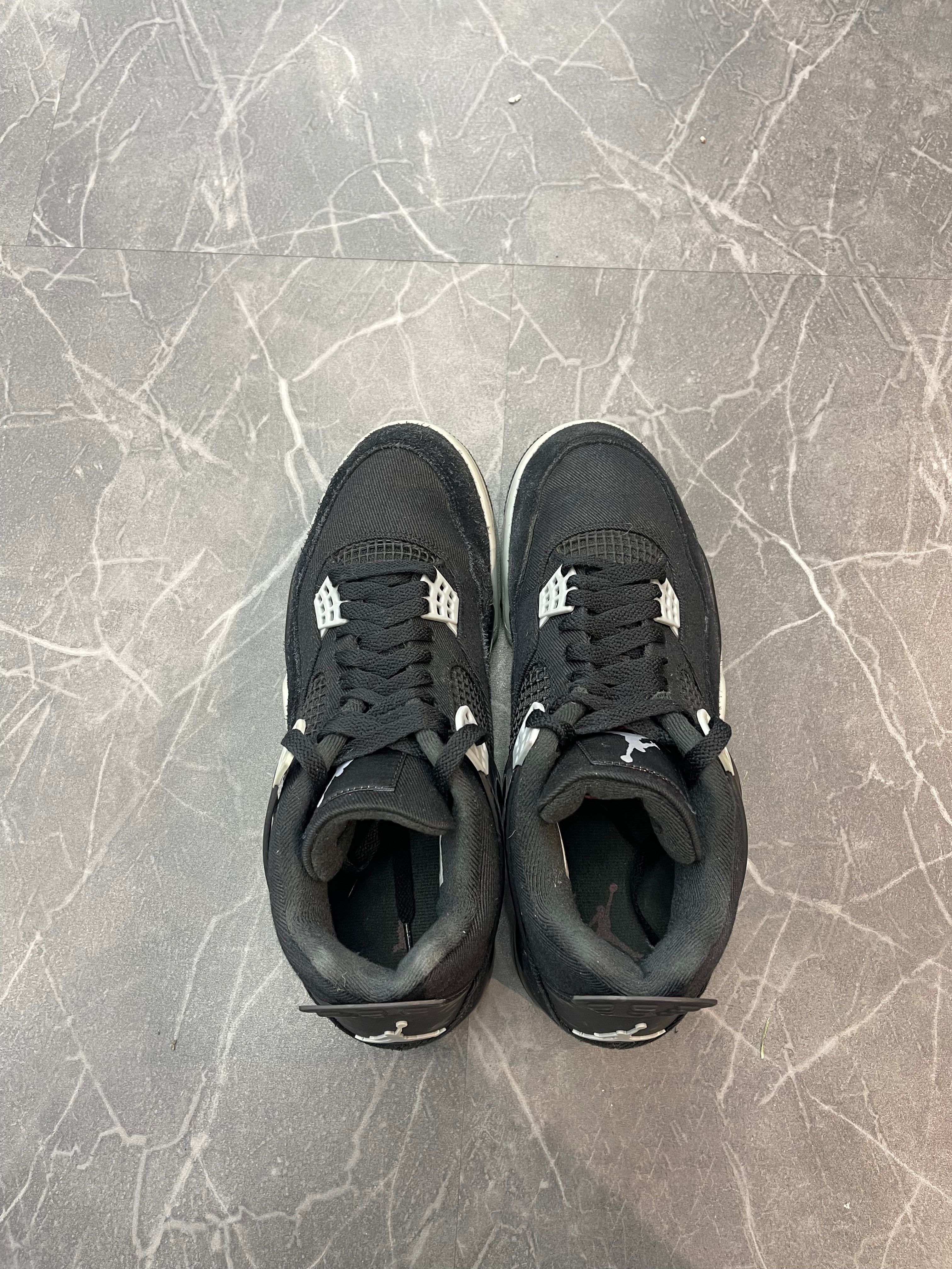 Jordan 4 “Black Canvas”