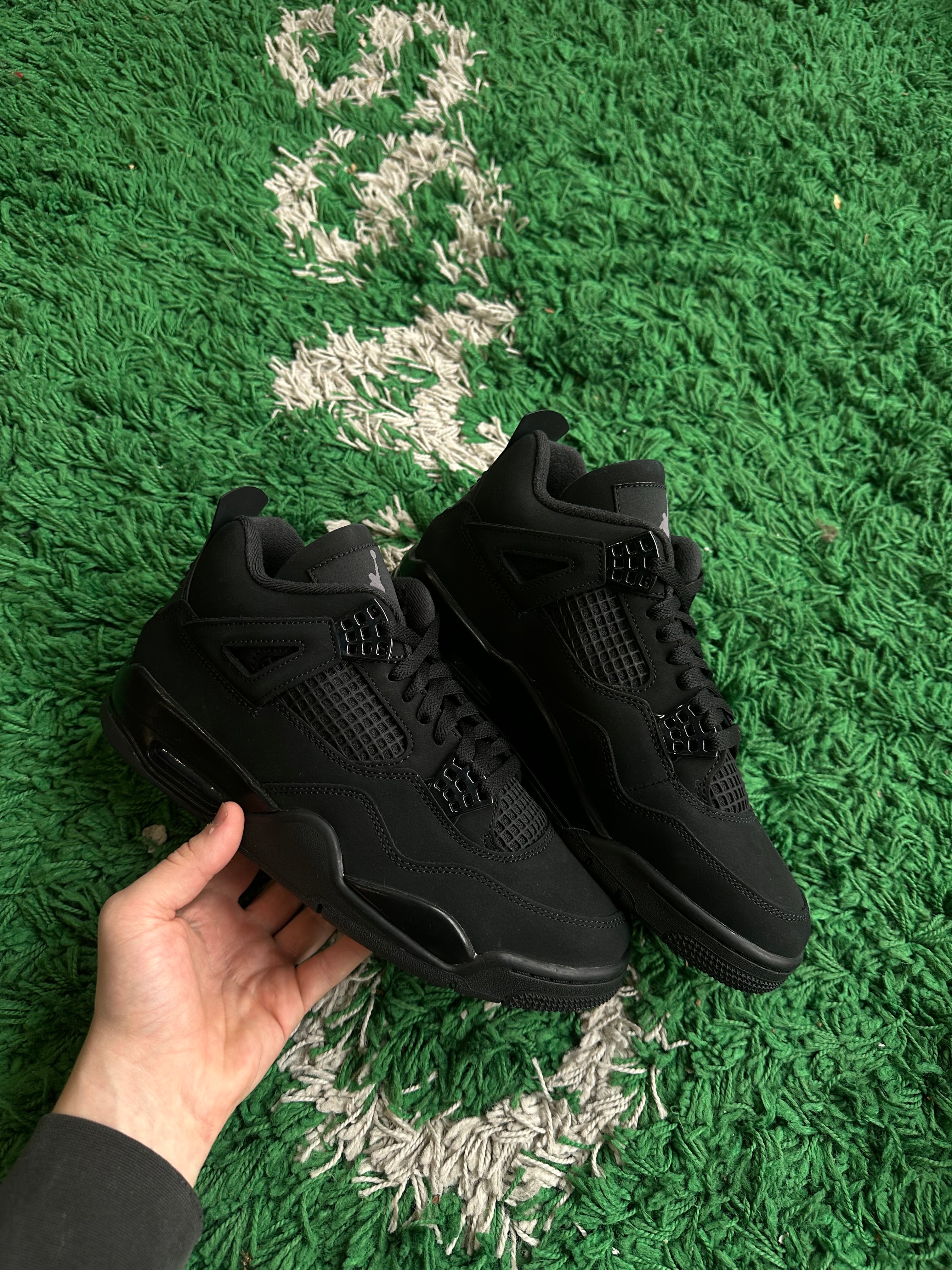 Jordan 4 “Black Cat” (2025)
