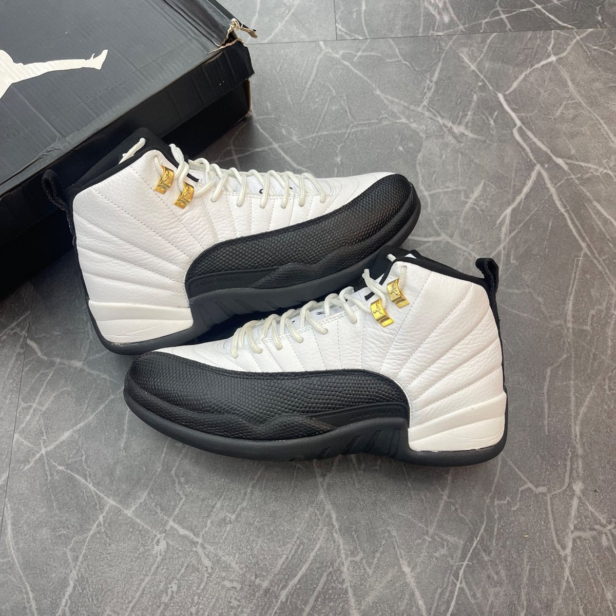 Jordan 12 Retro Taxi (2013) - Image 1