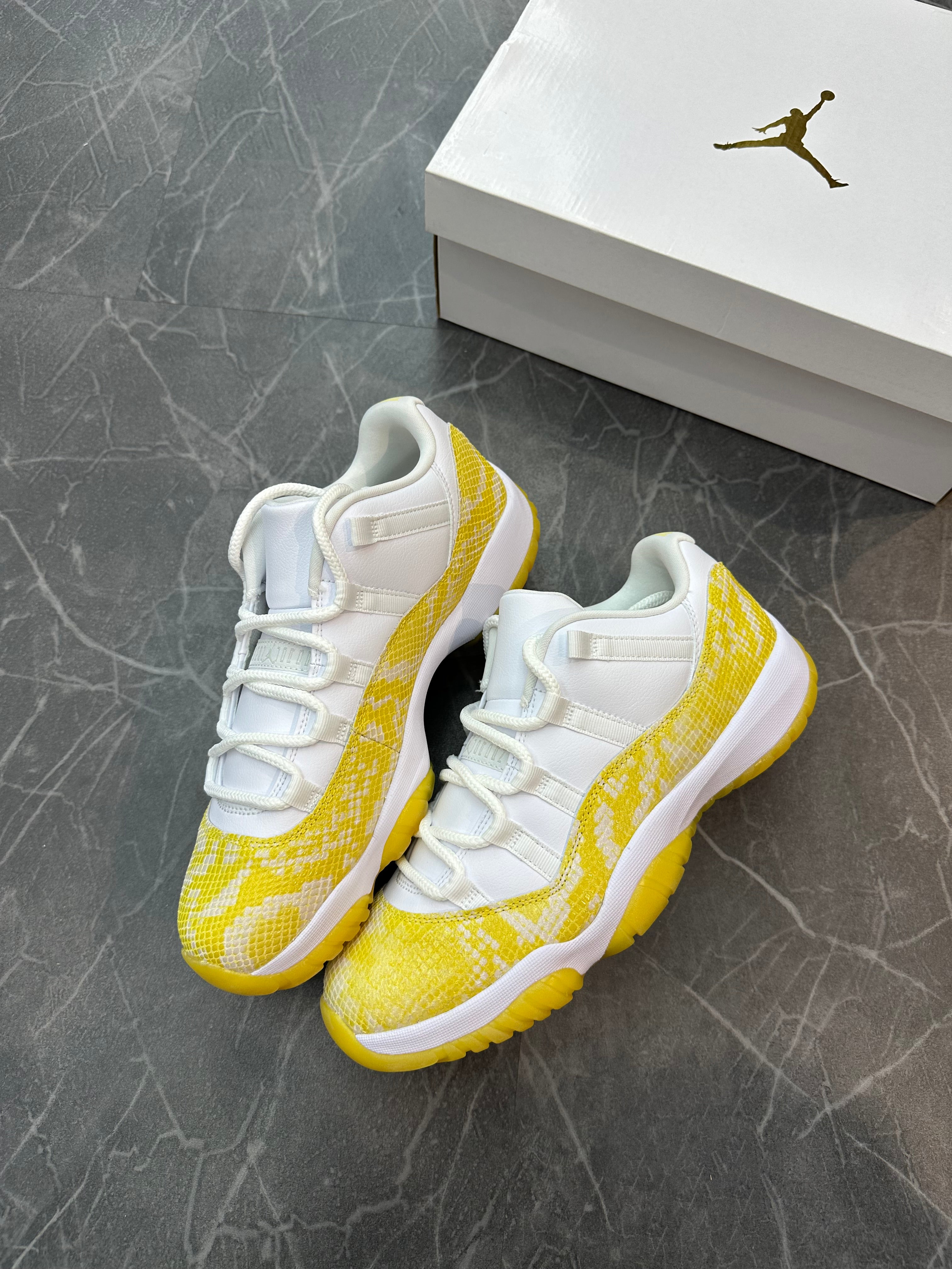 Jordan 11 Low “Yellow Snakeskin”