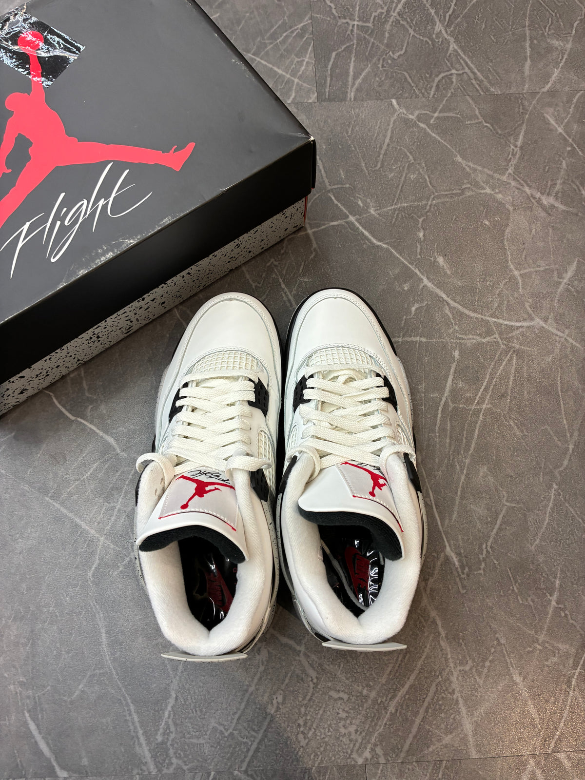 Jordan 4 “White Cement”