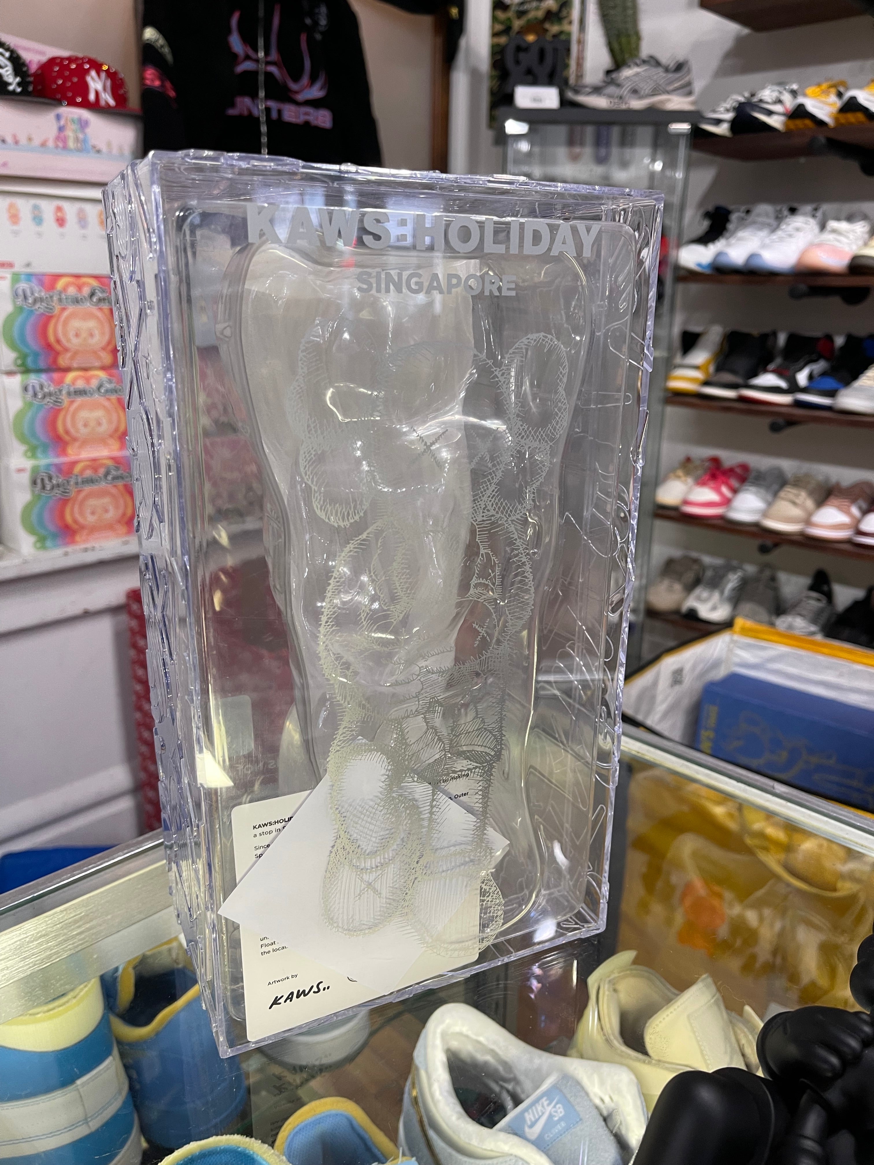 Kaws Holiday Singapore Vinyl Figure “Black”