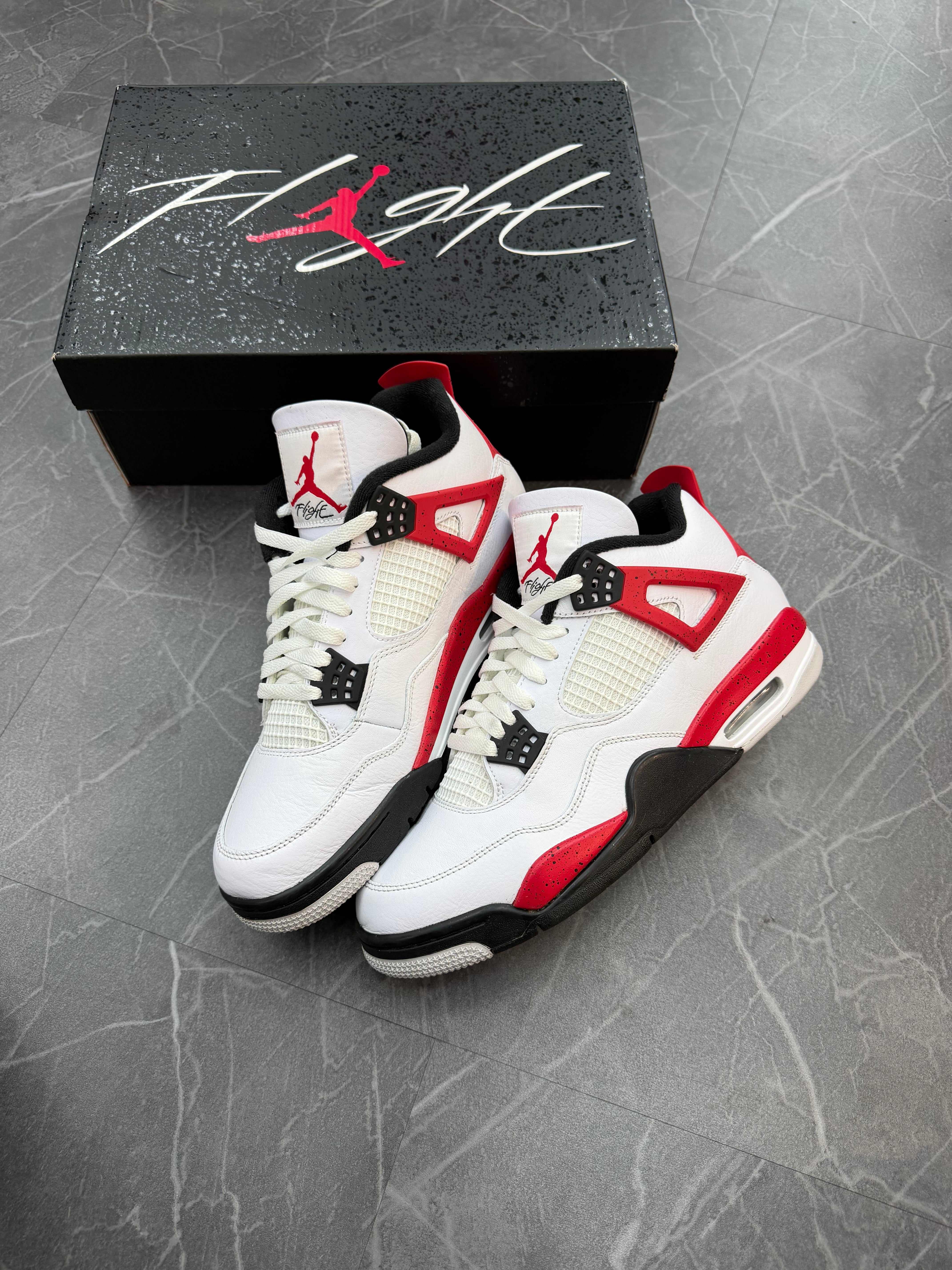 Jordan 4 “Red Cement”