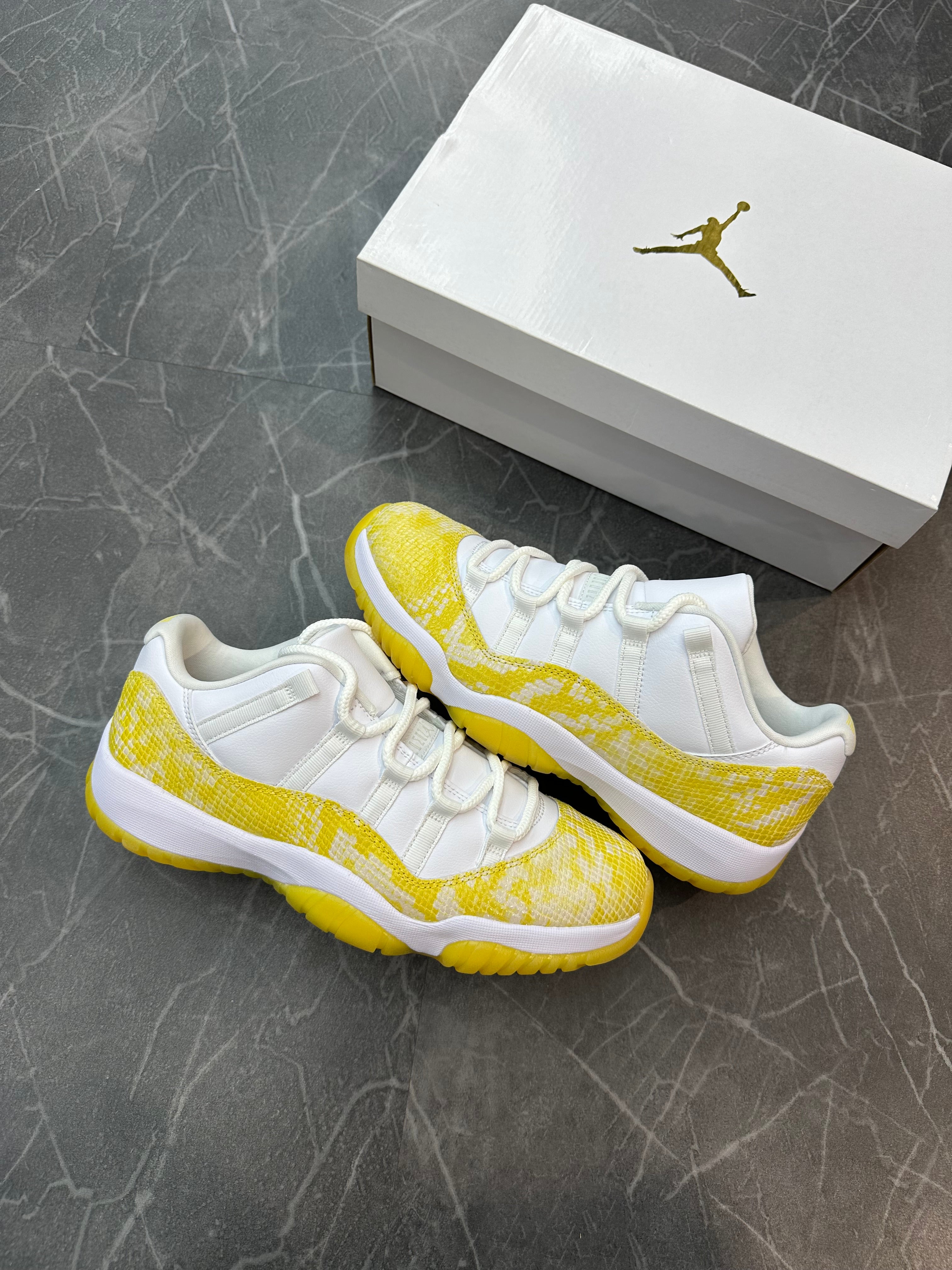 Jordan 11 Low “Yellow Snakeskin”