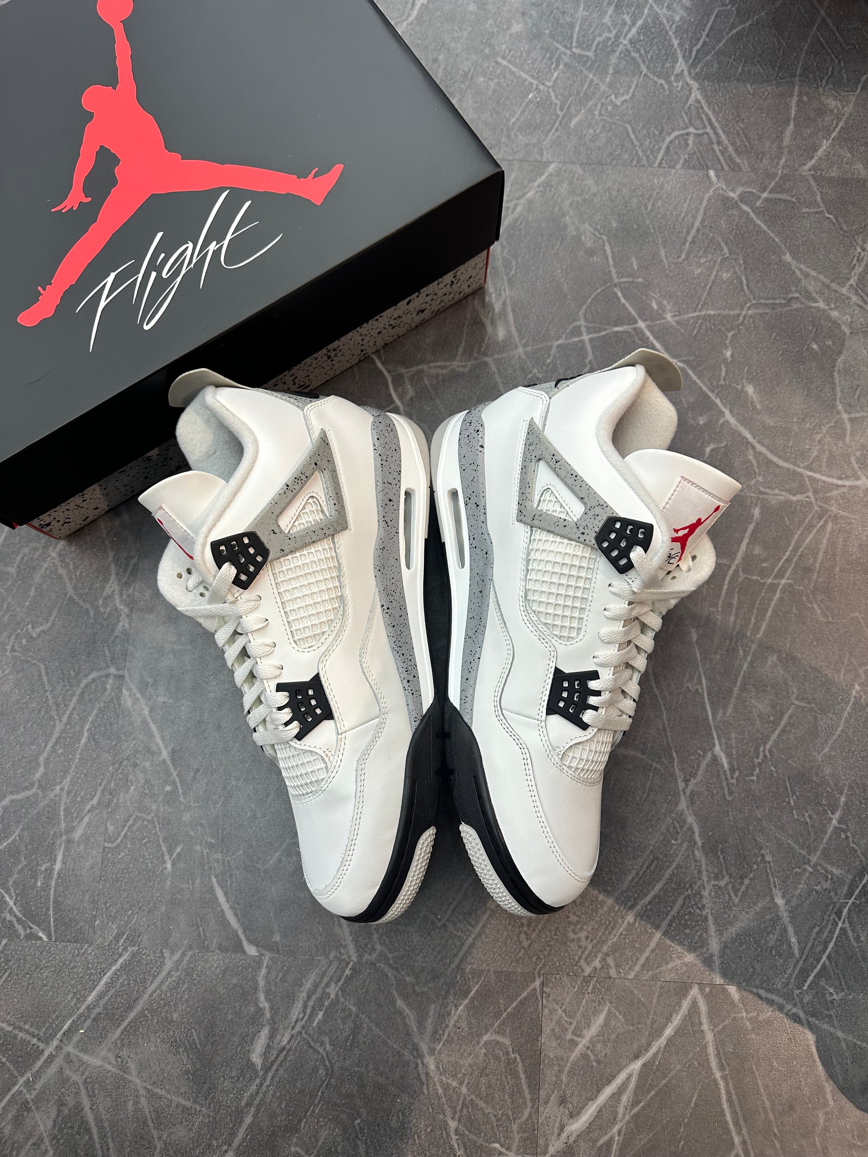 Jordan 4 “White Cement” (2025)