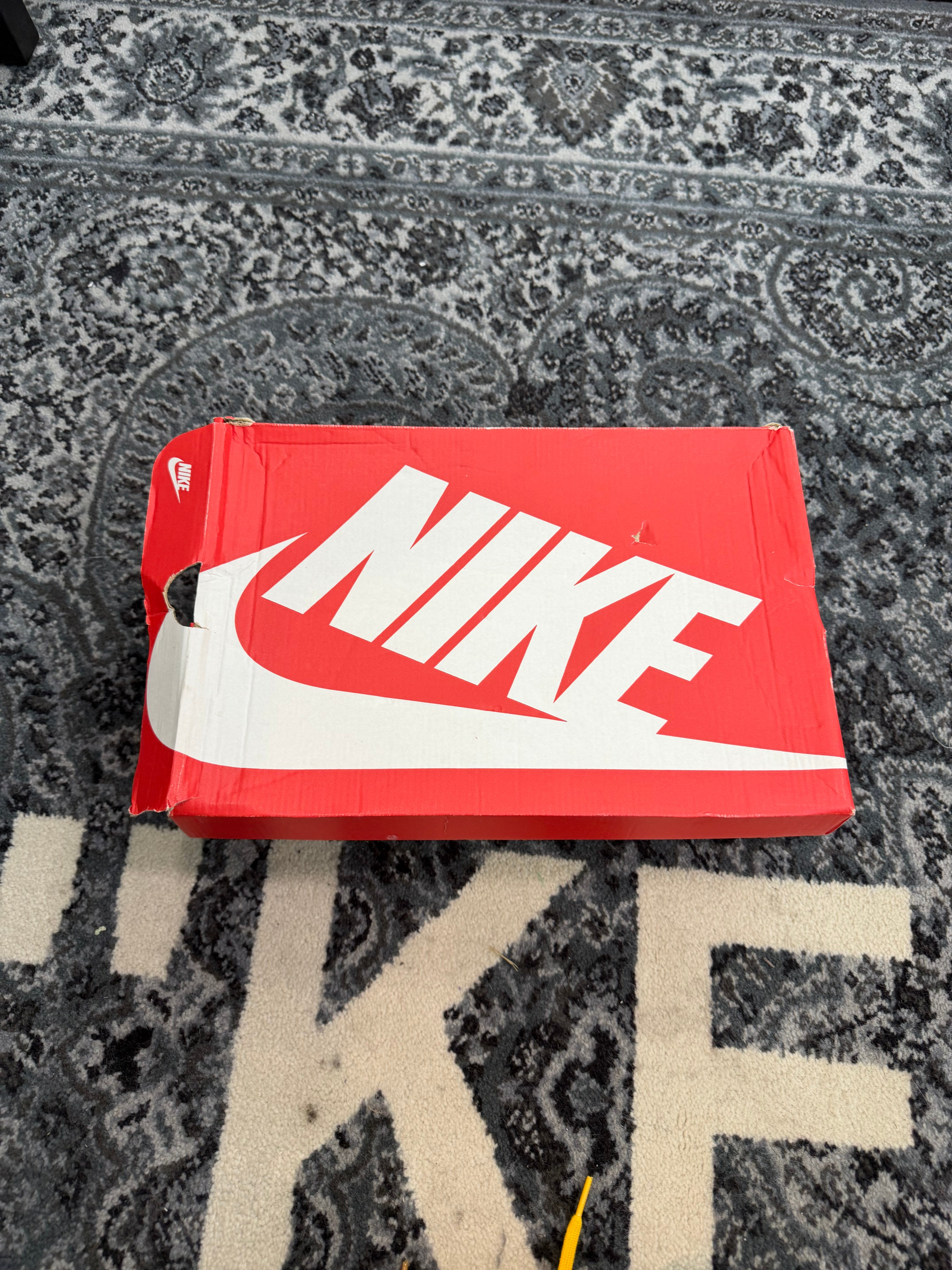 Nike Dunk High “First Use University Gold”