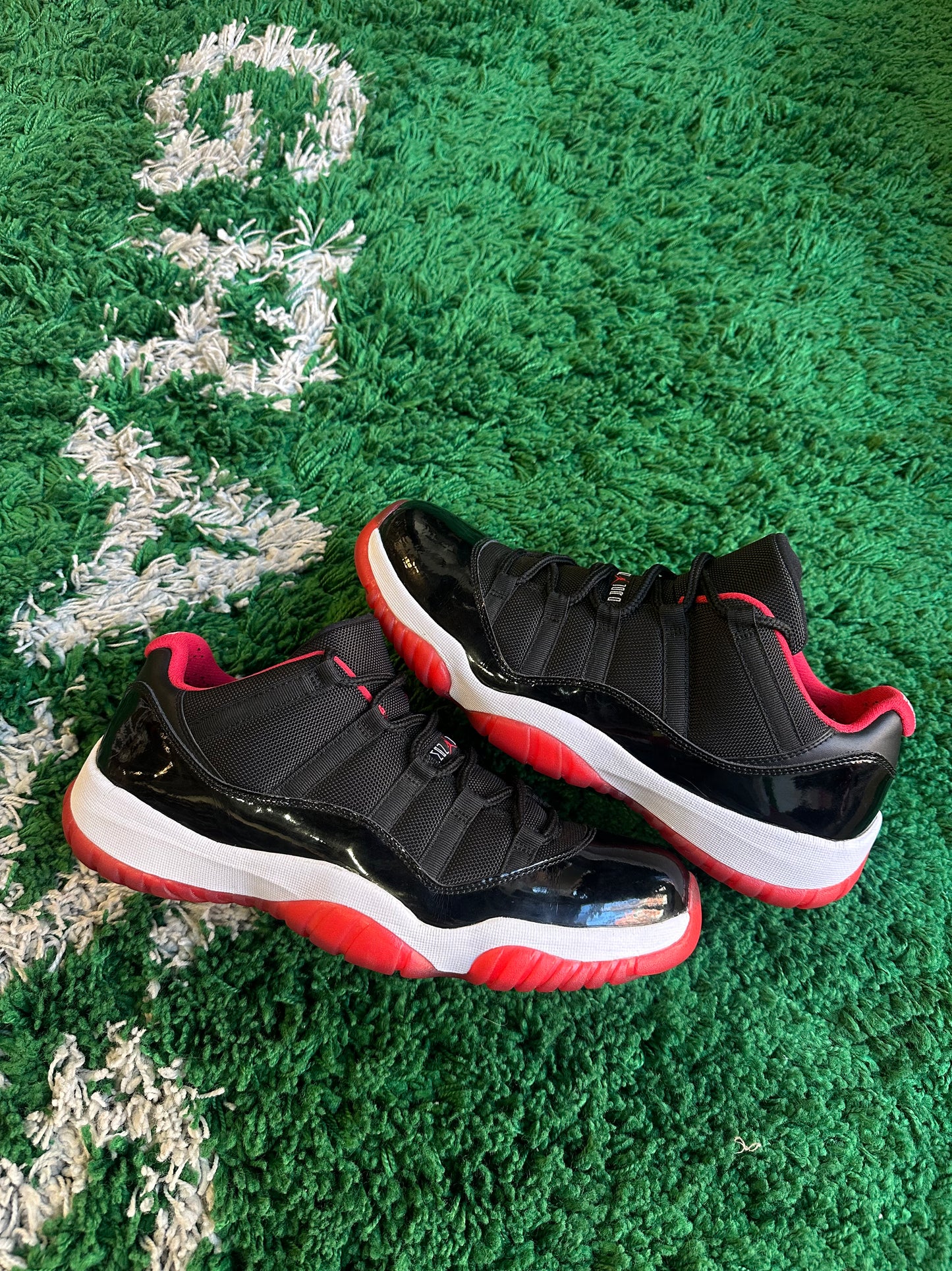 Jordan 11 Low “Bred”