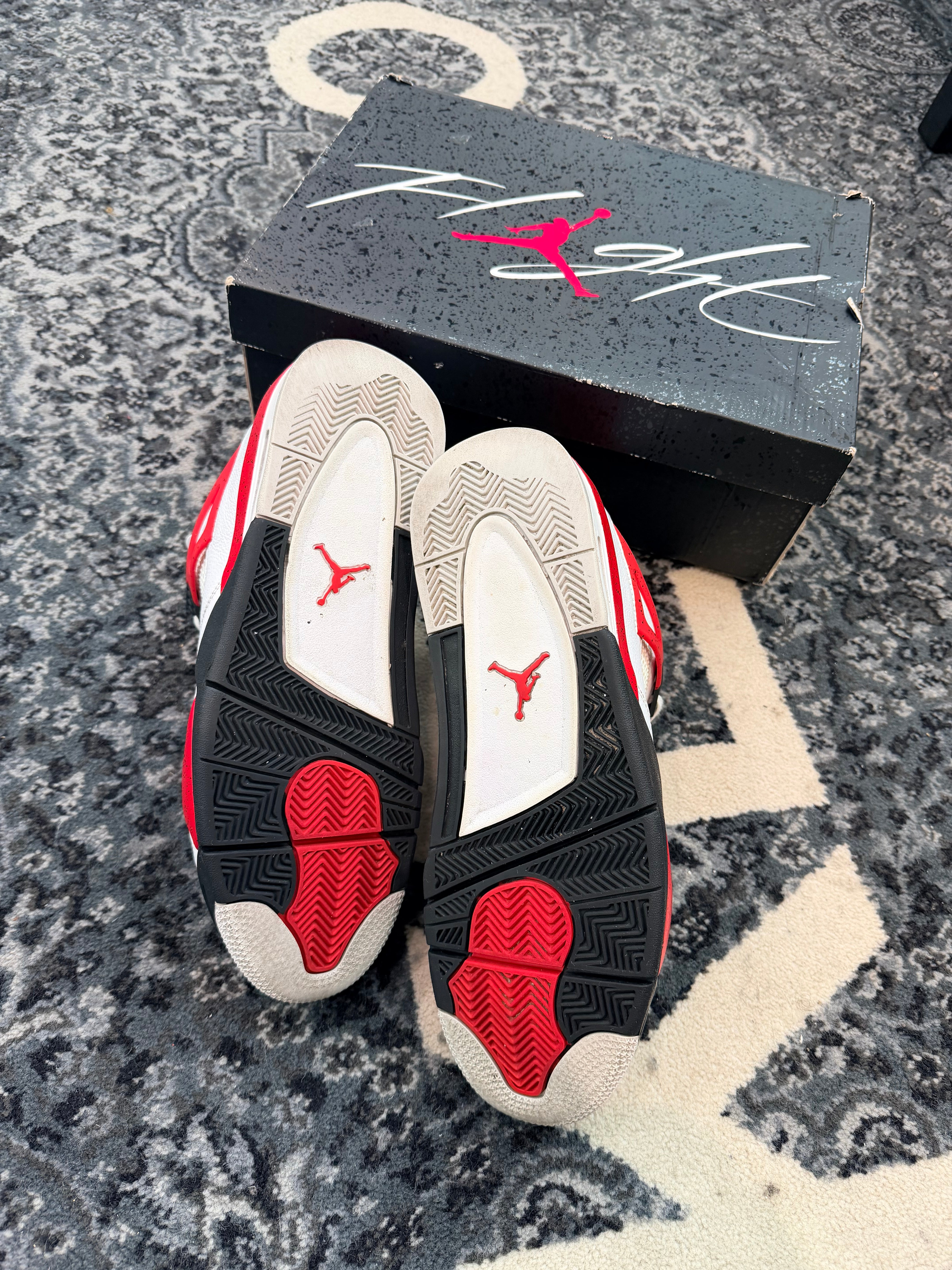Jordan 4 “Red Cement”