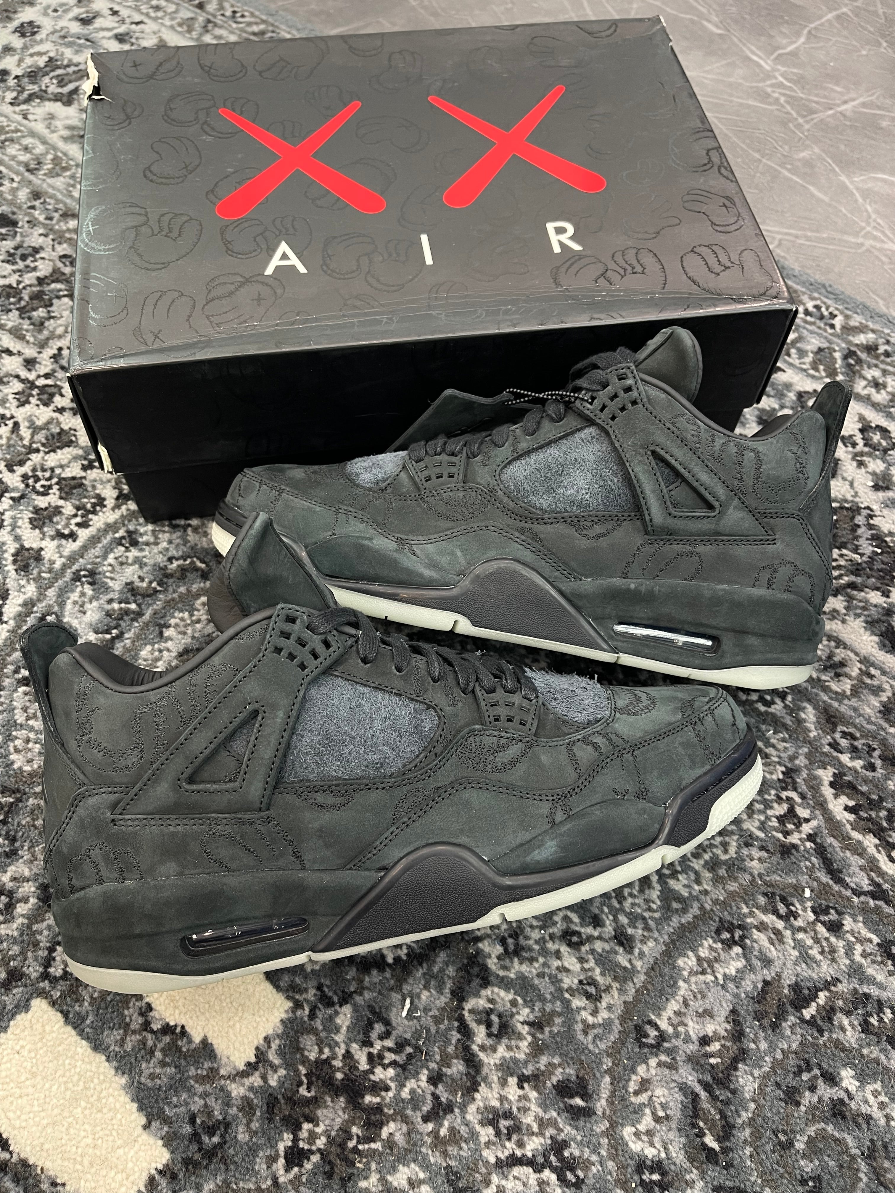 Jordan 4 x Kaws “Black”