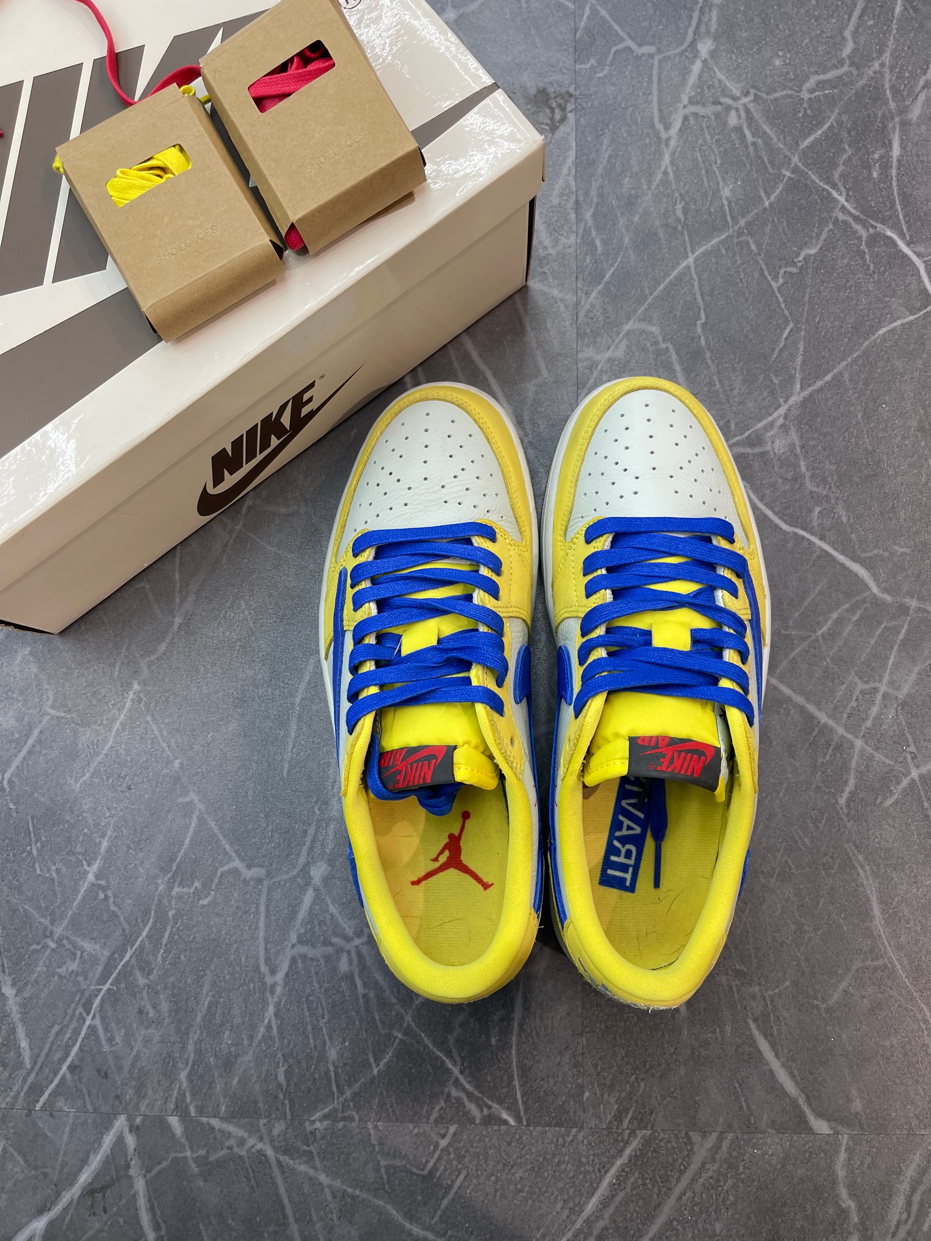 Travis Scott Jordan 1 Low “Canary”