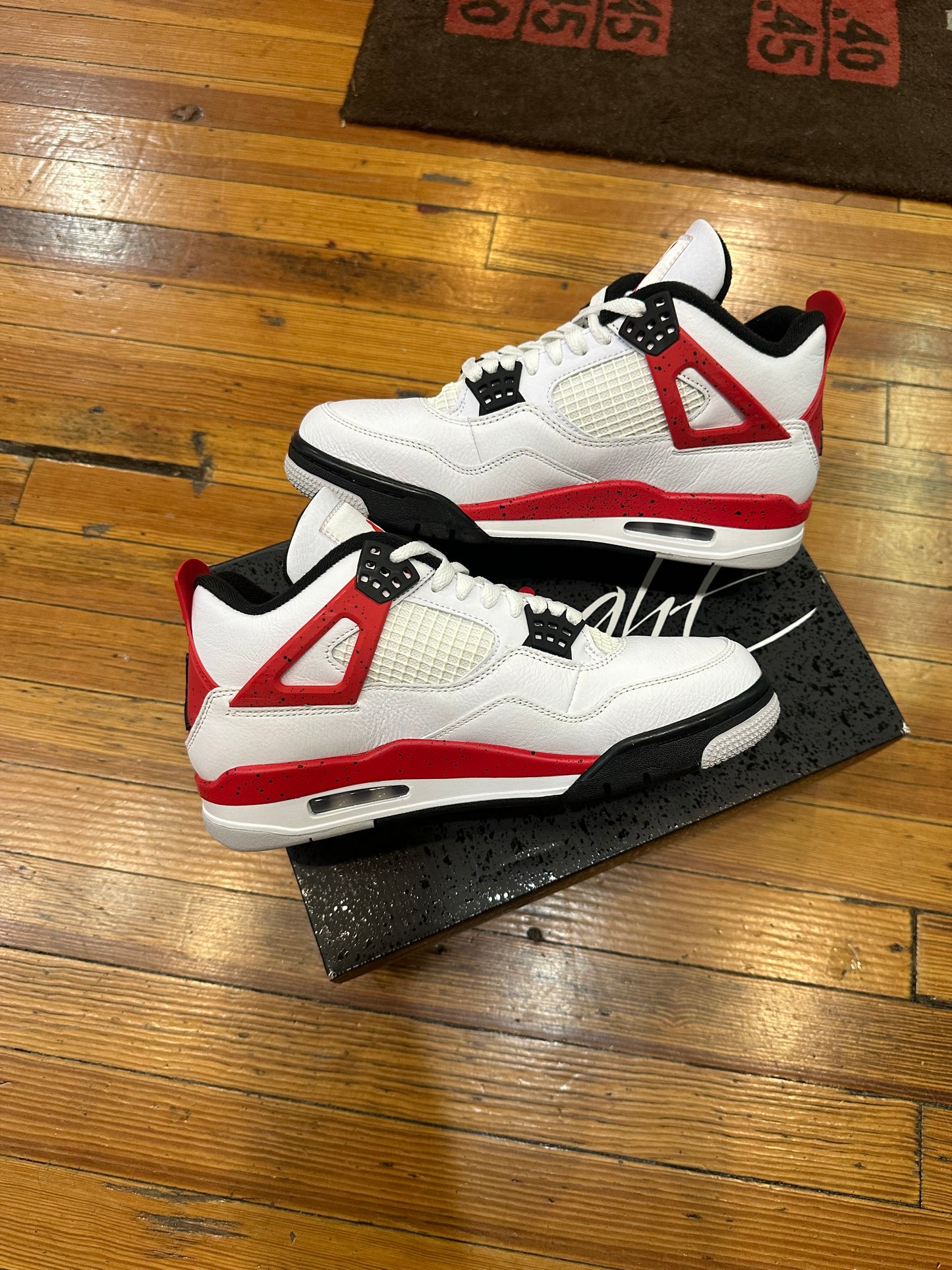 Jordan 4 “Red Cement”