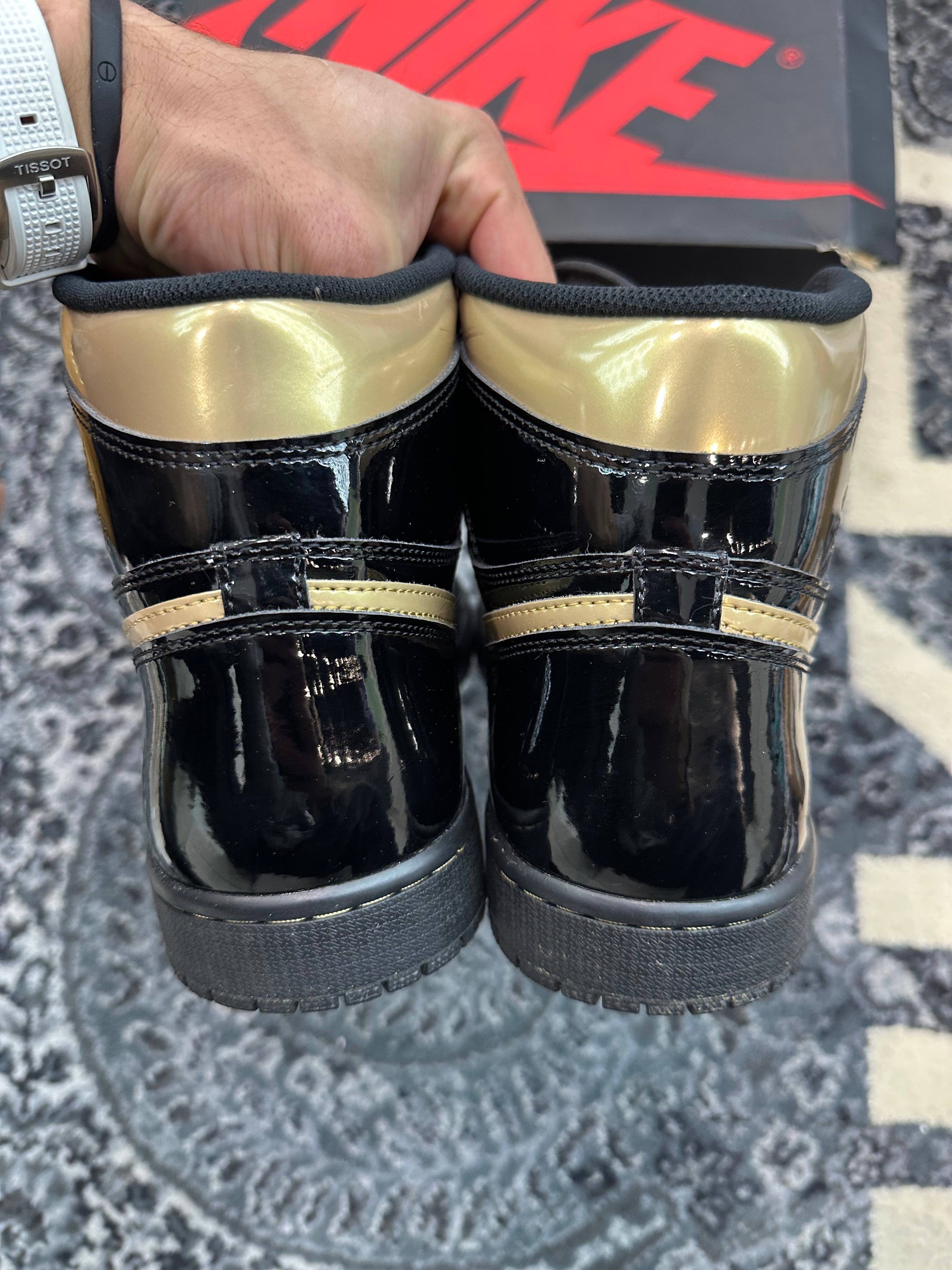 Jordan 1 High “Black Metallic Gold”