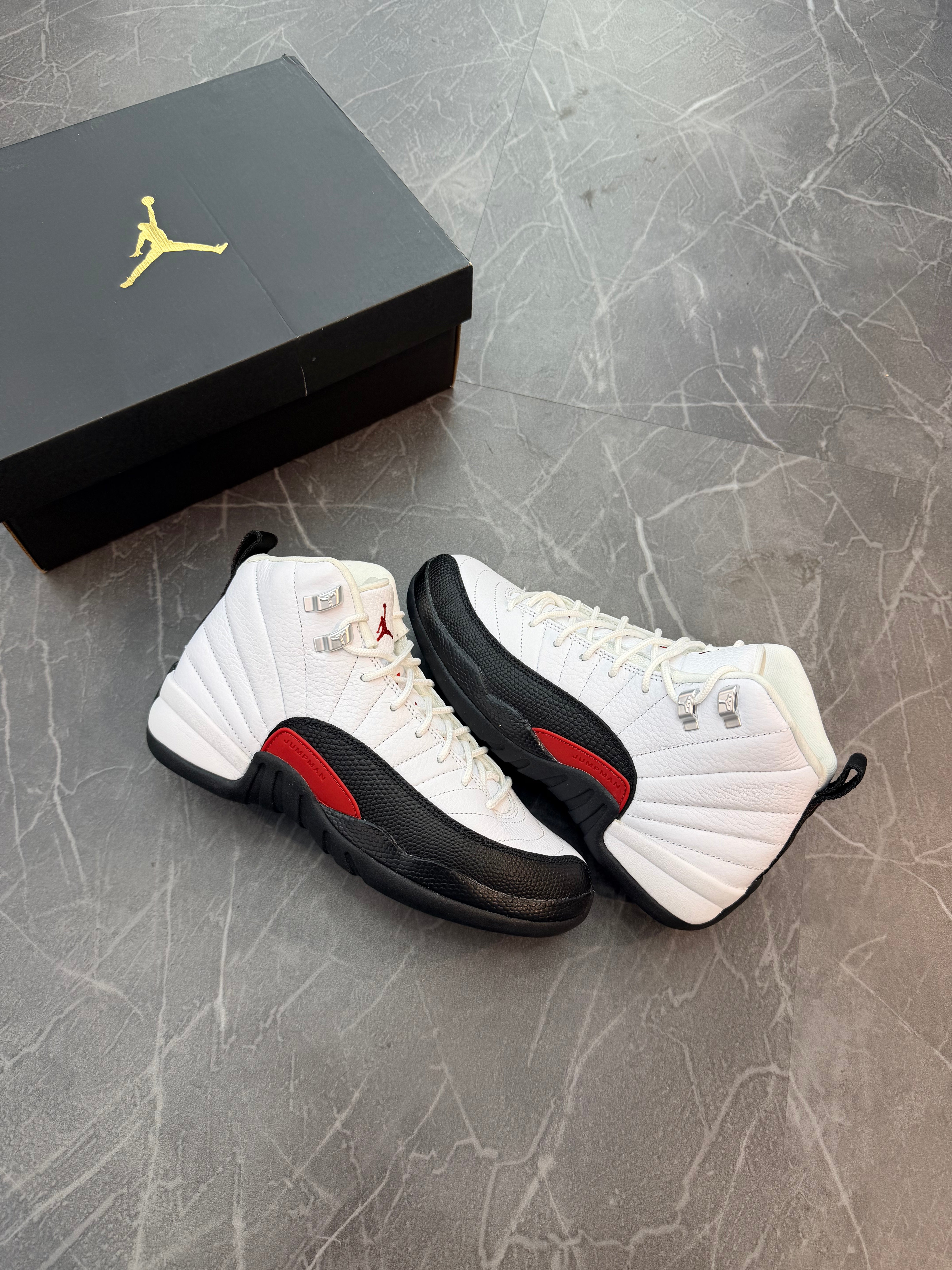 Jordan 12 “Taxi Flip”