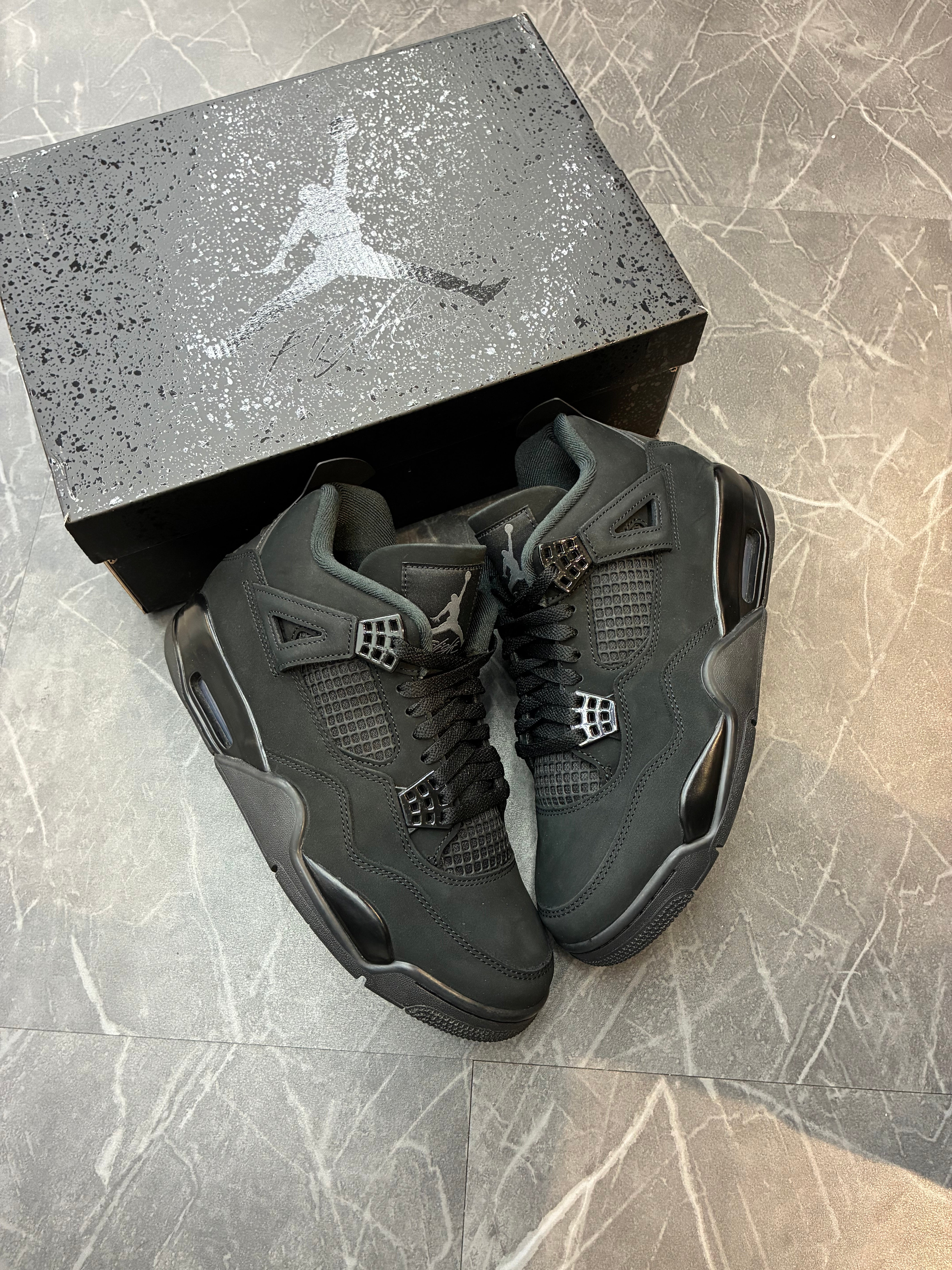 Jordan 4 “Black Cat” (2025)