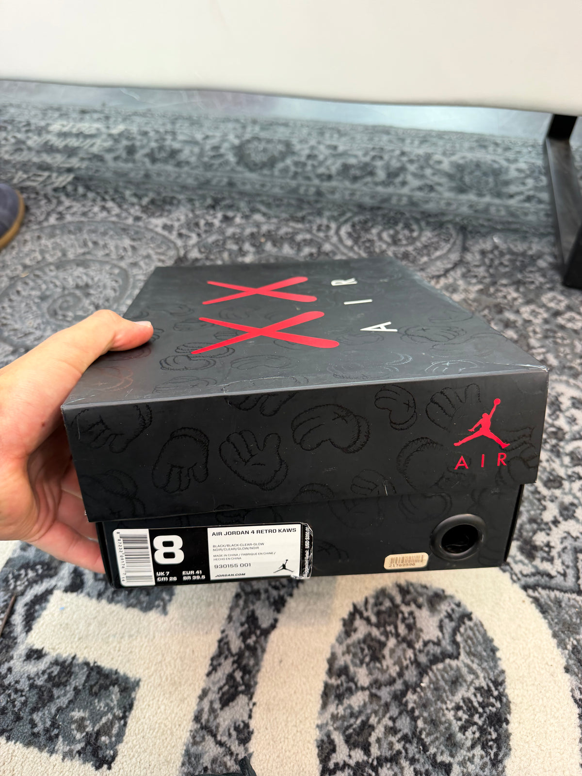 Jordan 4 x Kaws “Black”
