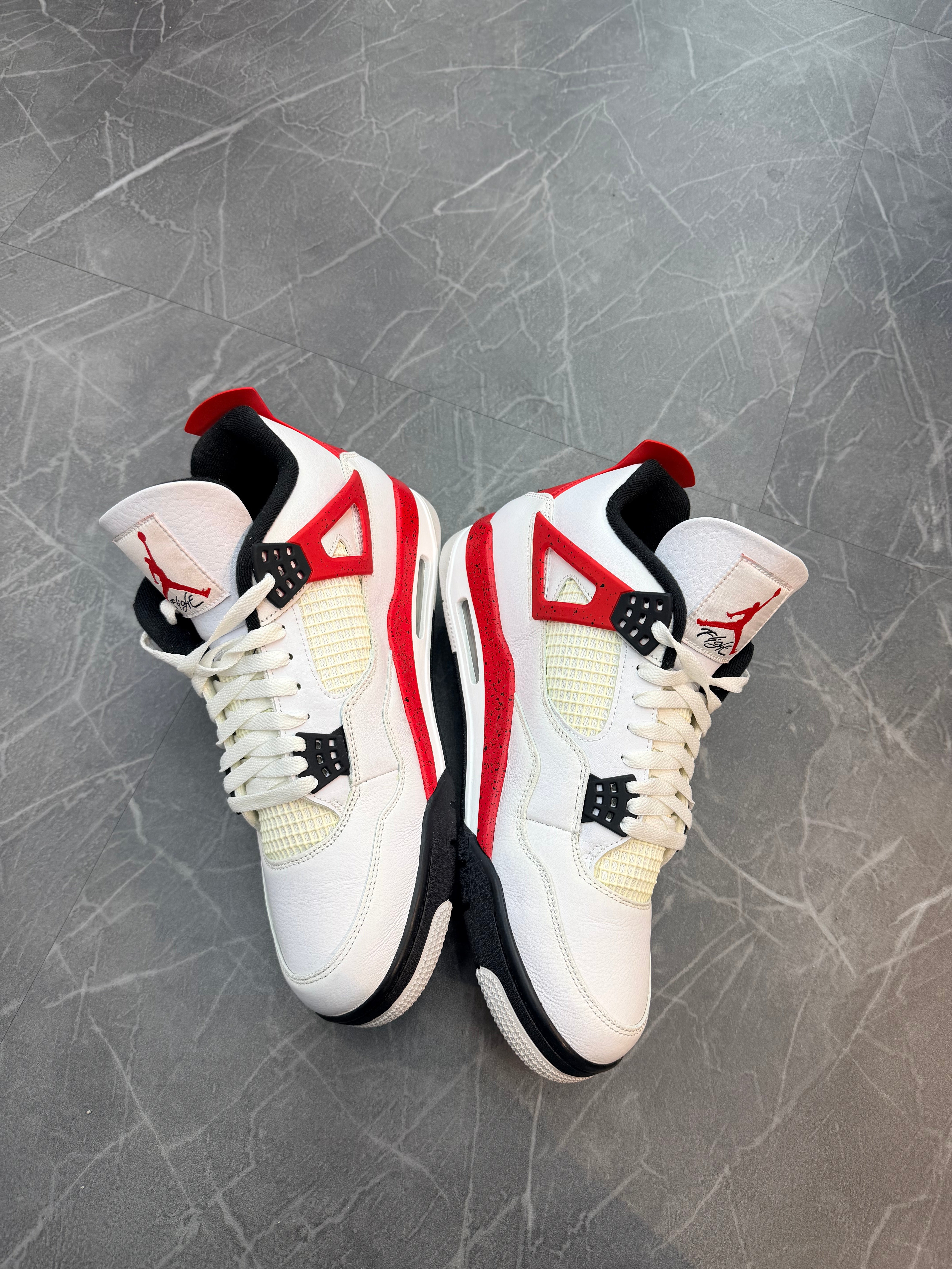 Jordan 4 “Red Cement”