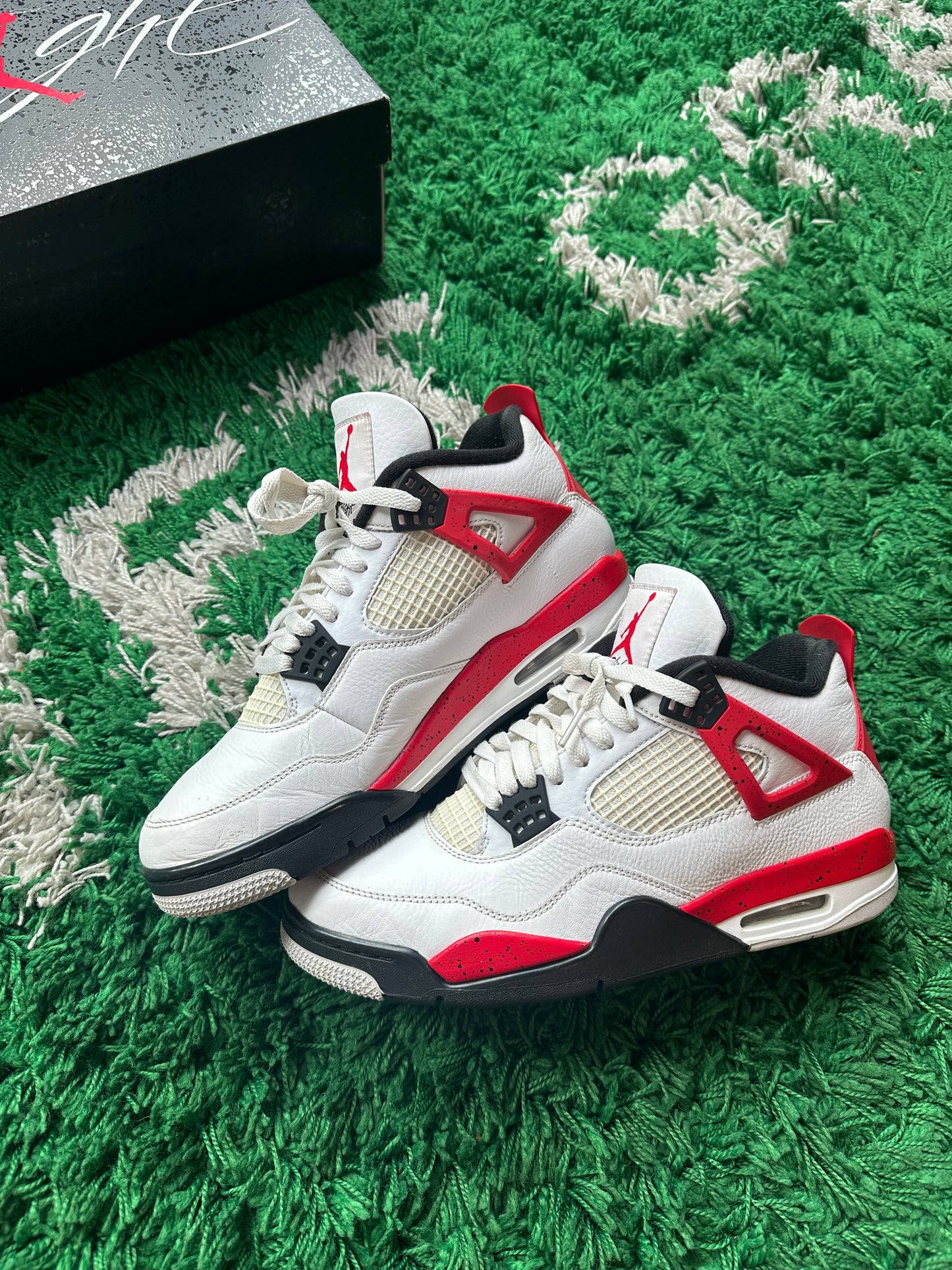 Jordan 4 “Red Cement”