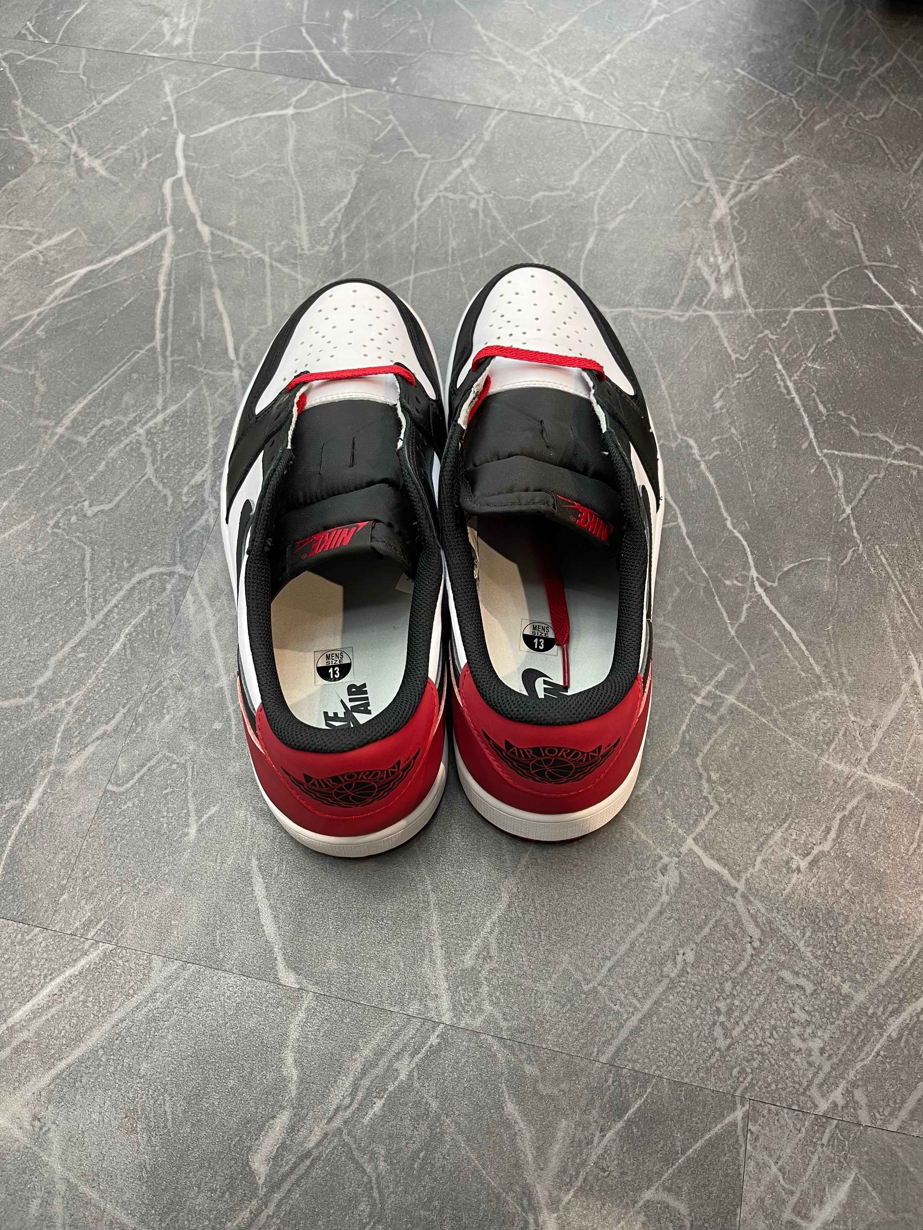 Jordan 1 Low “Black Toe”