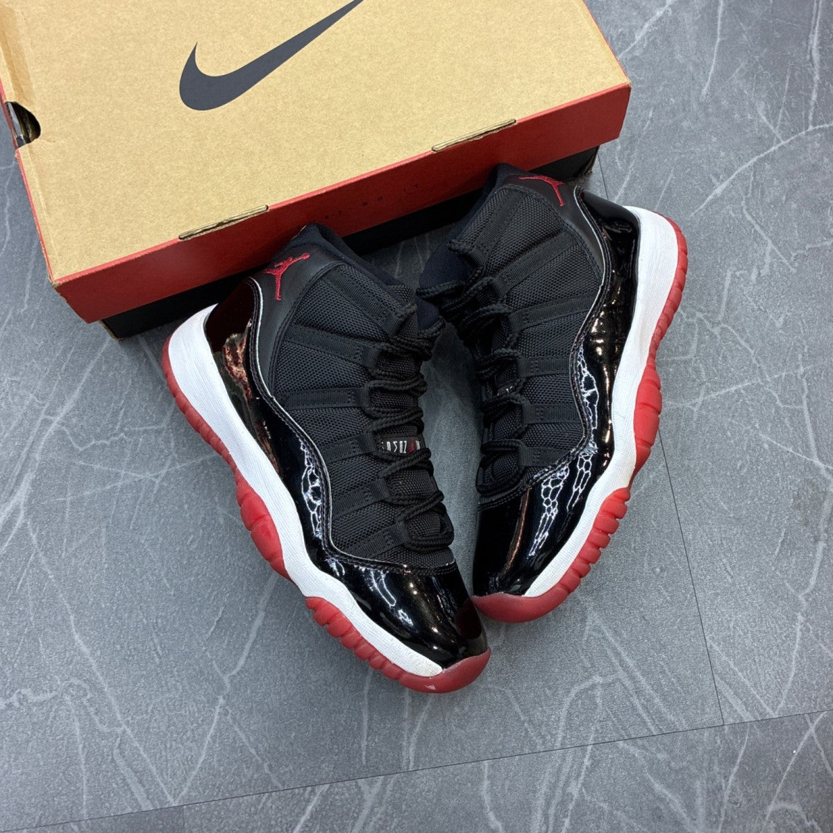 Jordan 11 Retro Playoffs Bred (2019) (GS) - Image 1