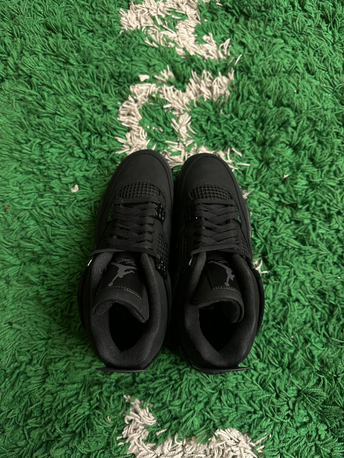 Jordan 4 “Black Cat” (2025)