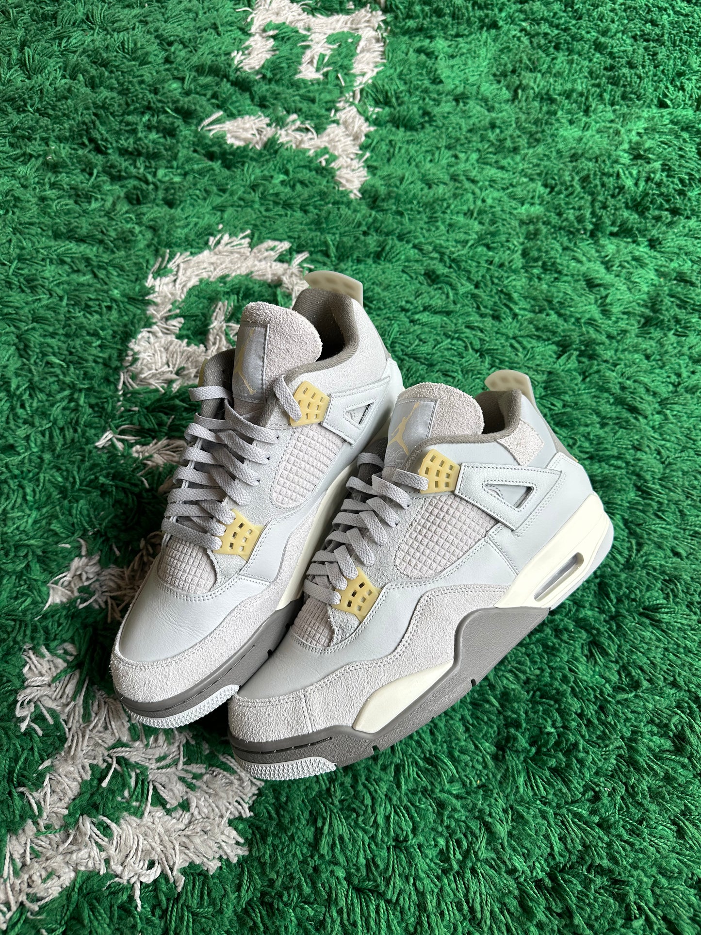Jordan 4 “Craft Photon Dust”