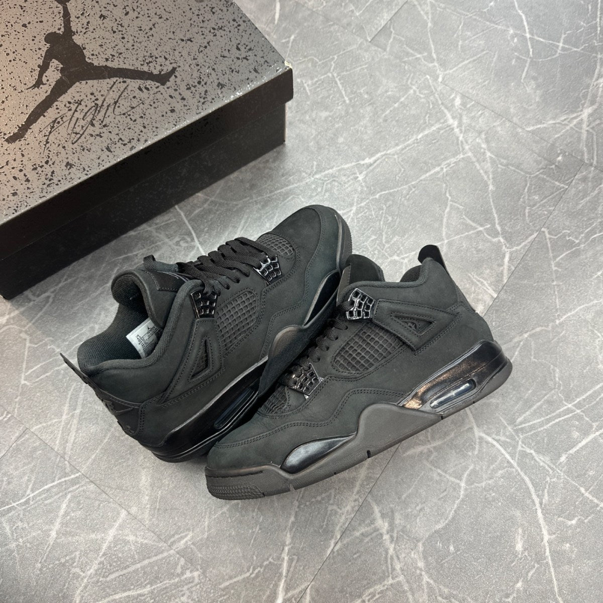 Jordan 4 Retro Black Cat (2025) - Image 1