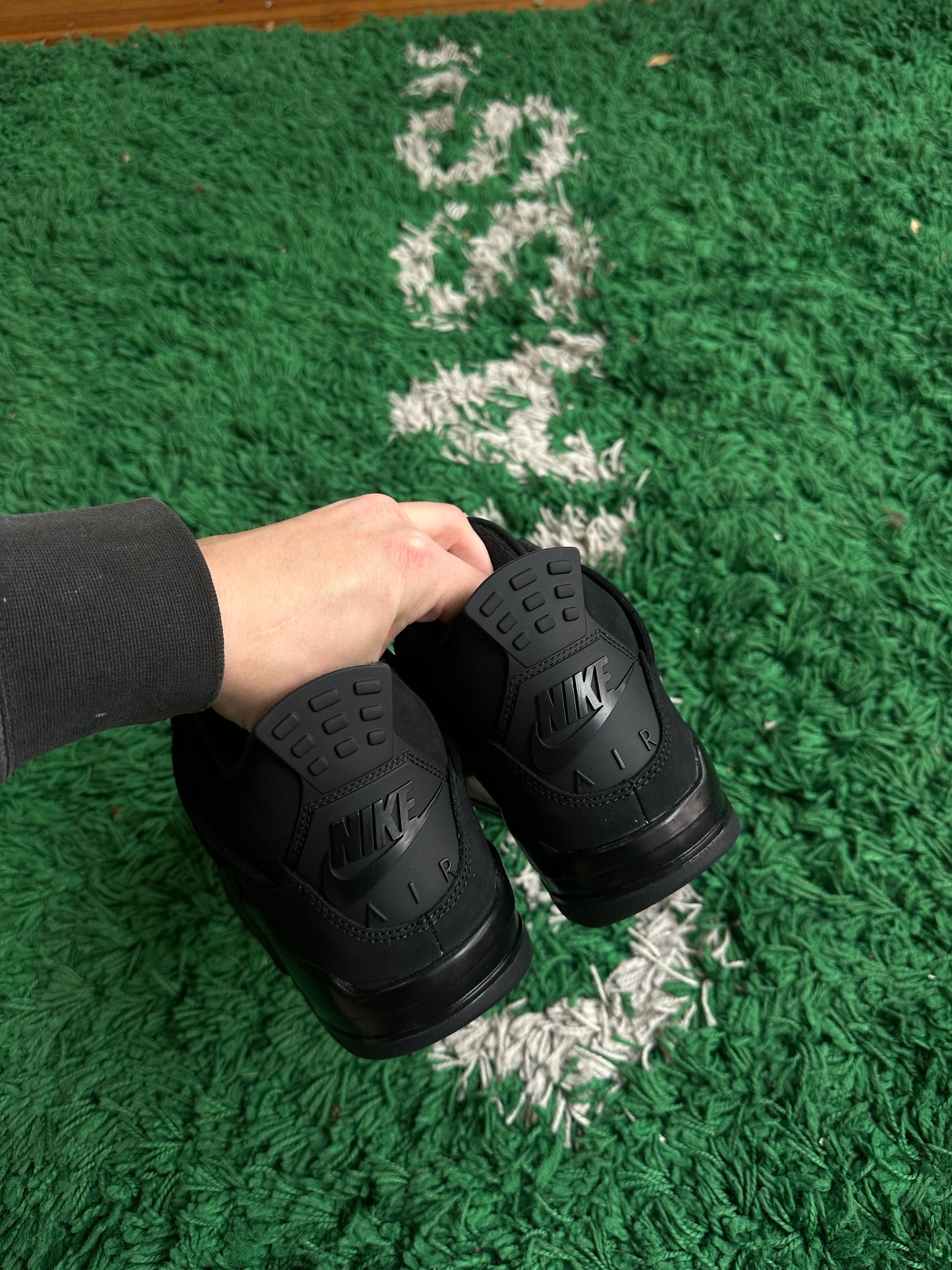 Jordan 4 “Black Cat” (2025)