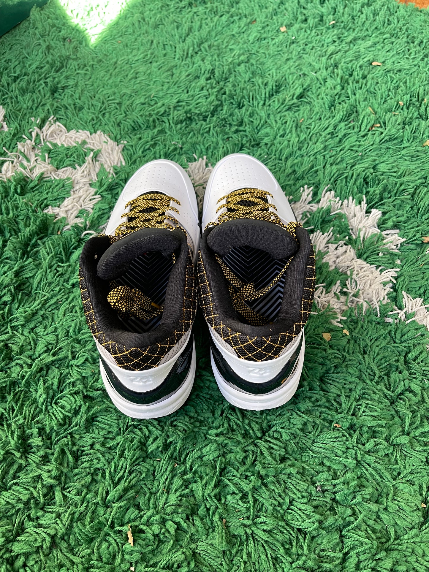 Nike Kobe 4 Protro “White Black Del Sol”