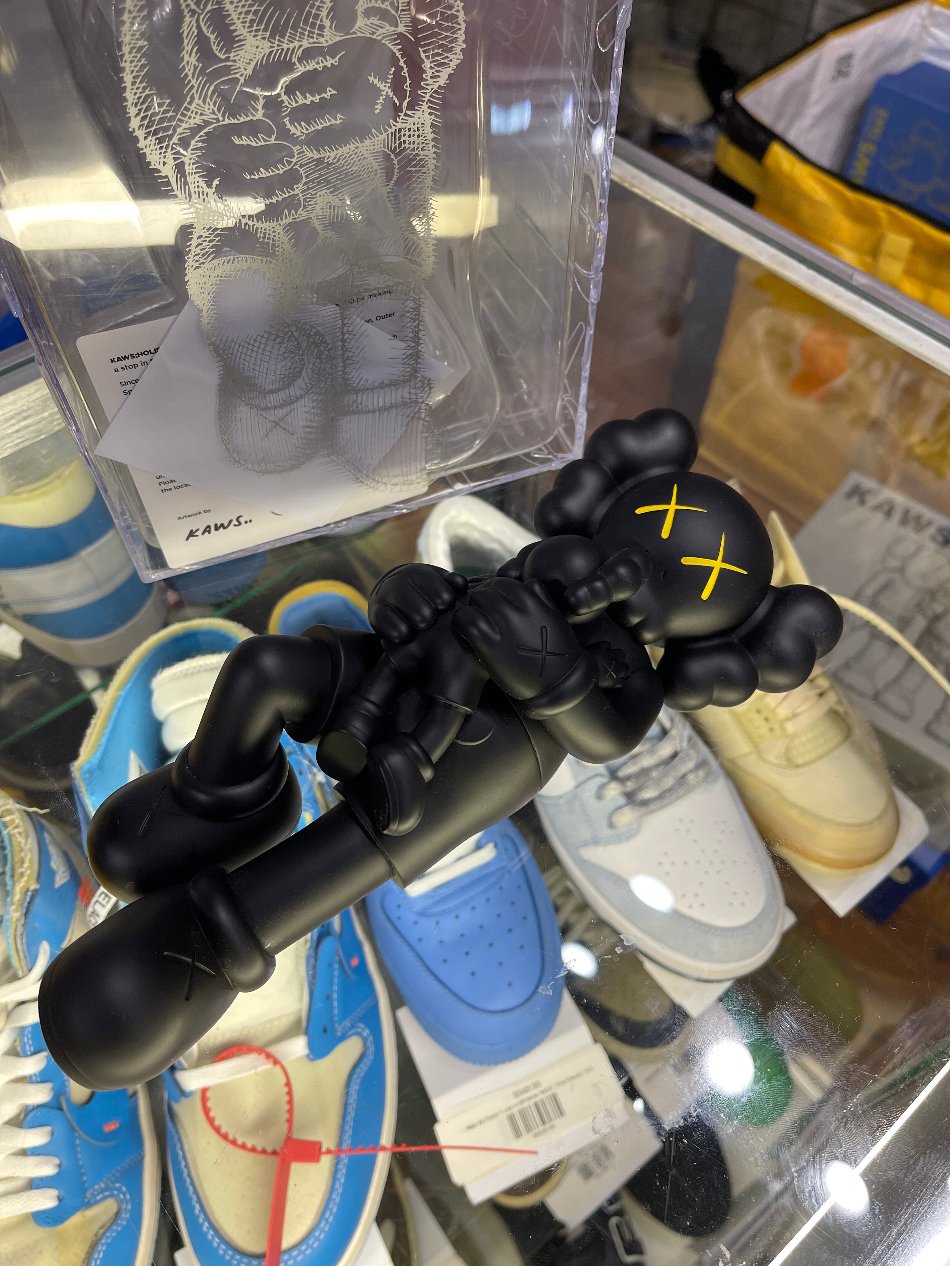 Kaws Holiday Singapore Vinyl Figure “Black”