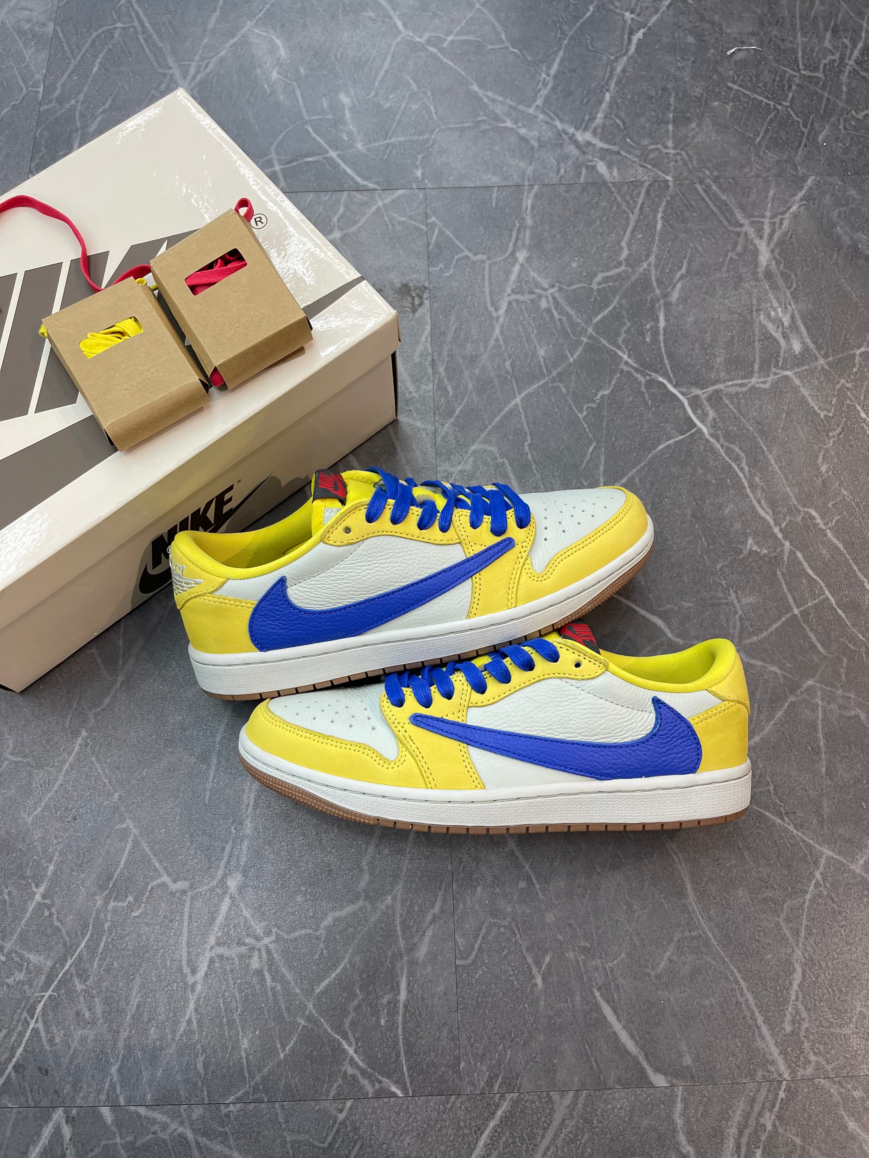 Travis Scott Jordan 1 Low “Canary”