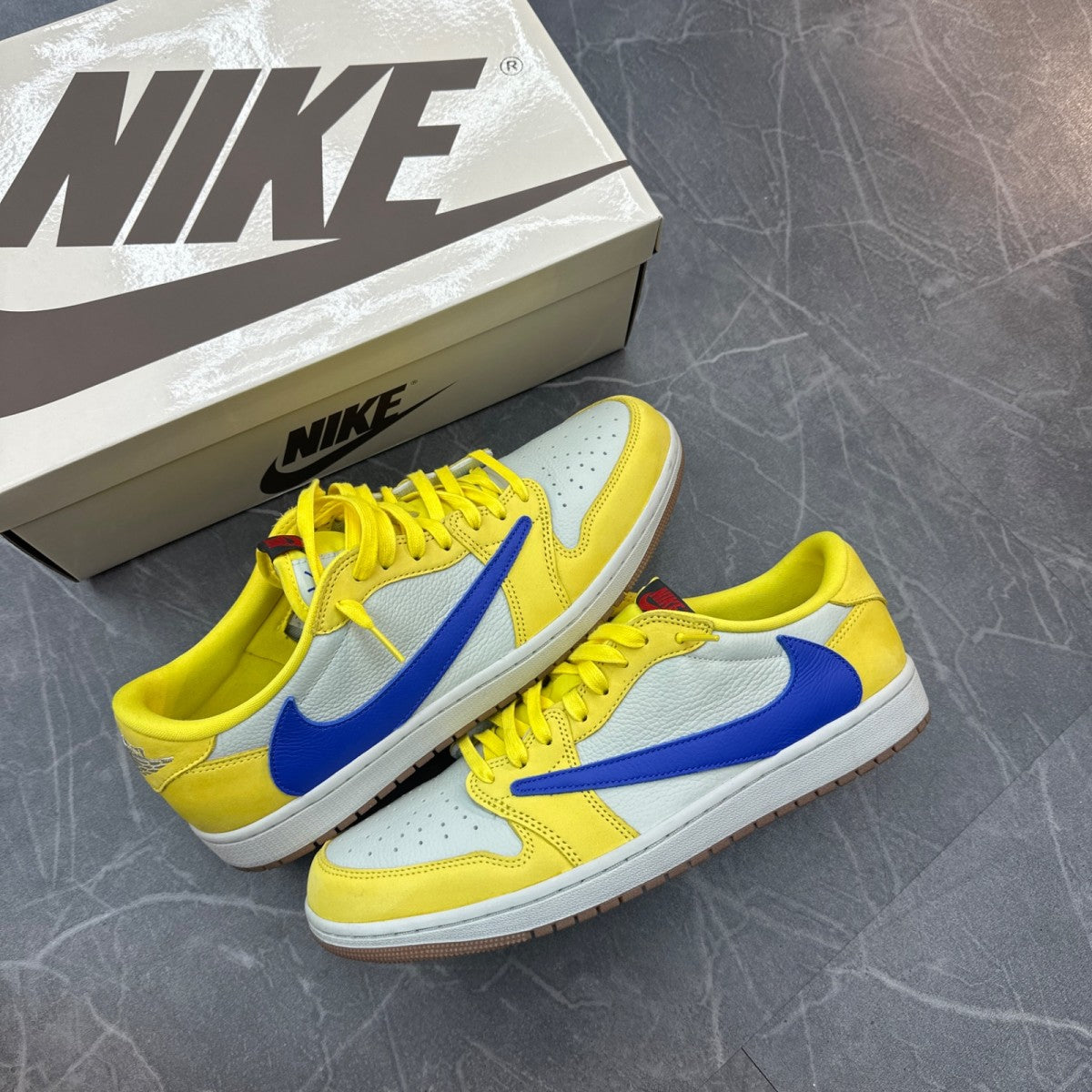 Jordan 1 Retro Low OG SP Travis Scott Canary (Women's) - Image 1