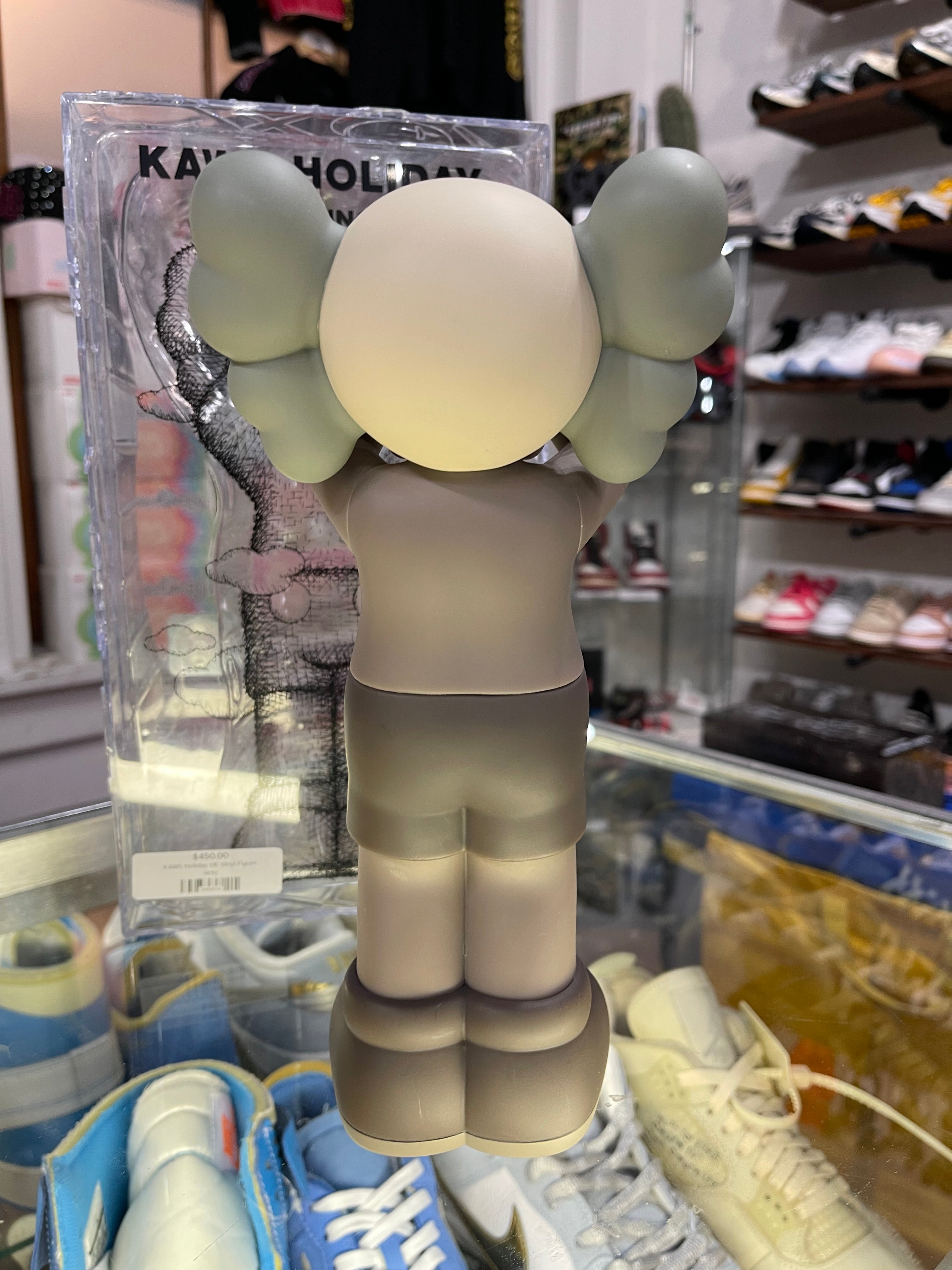 Kaws Holiday UK Vinyl Figure “Brown”
