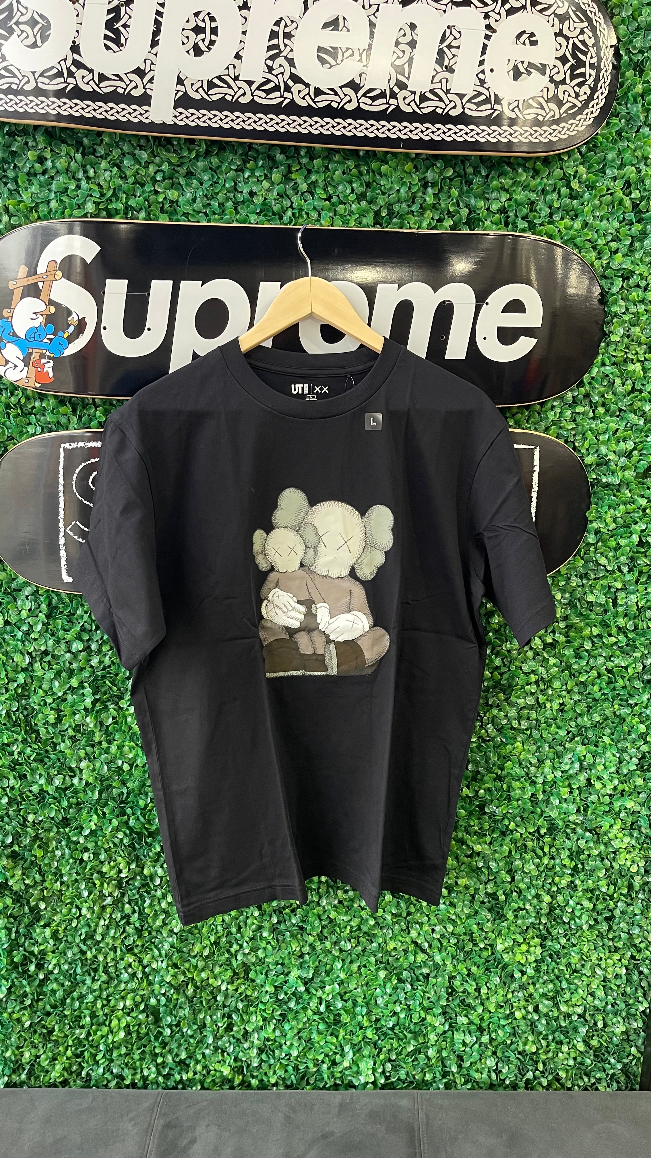Kaws Uniqlo Tee Black Sitting Down