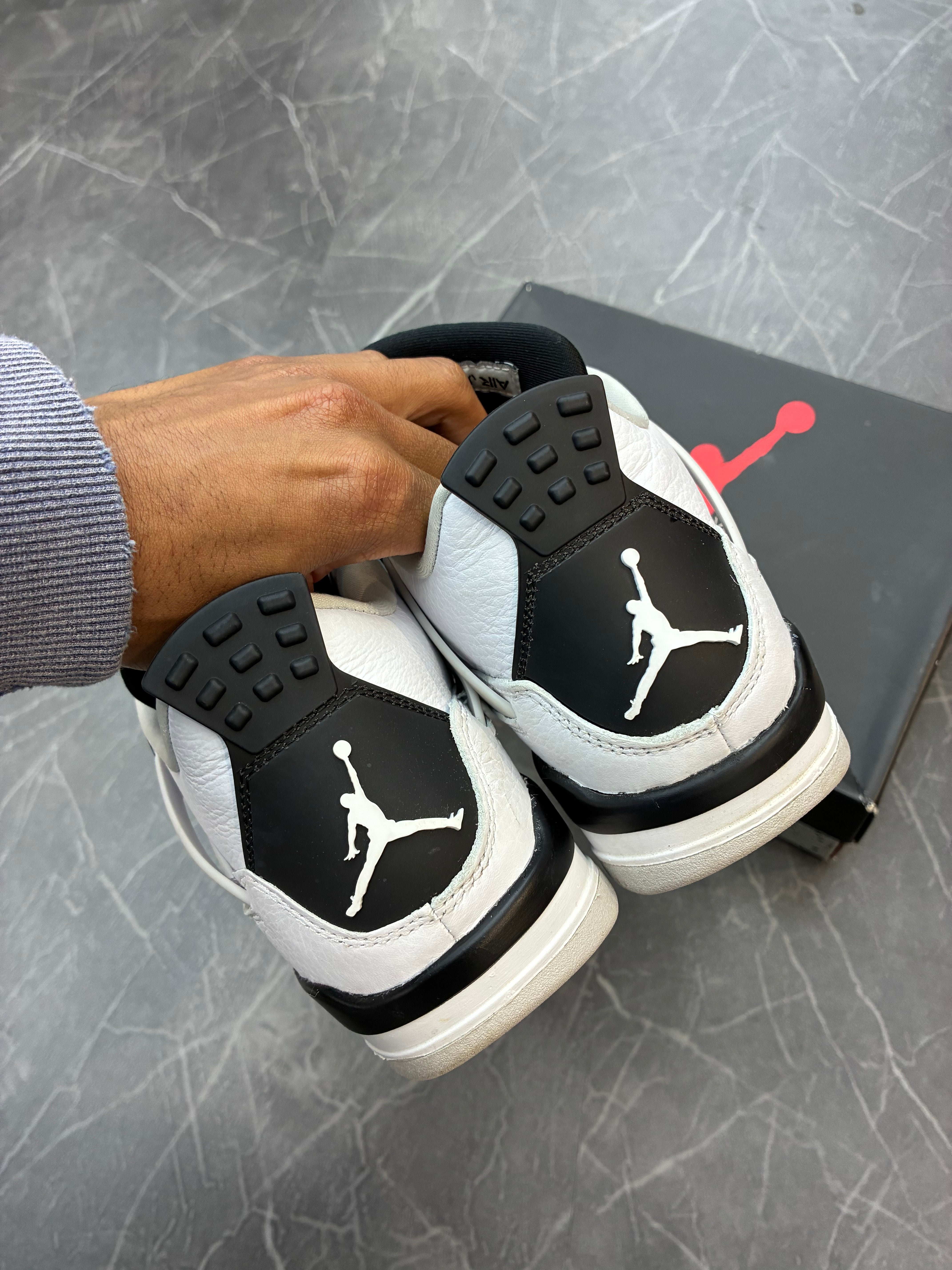 Jordan 4 “Military Black”