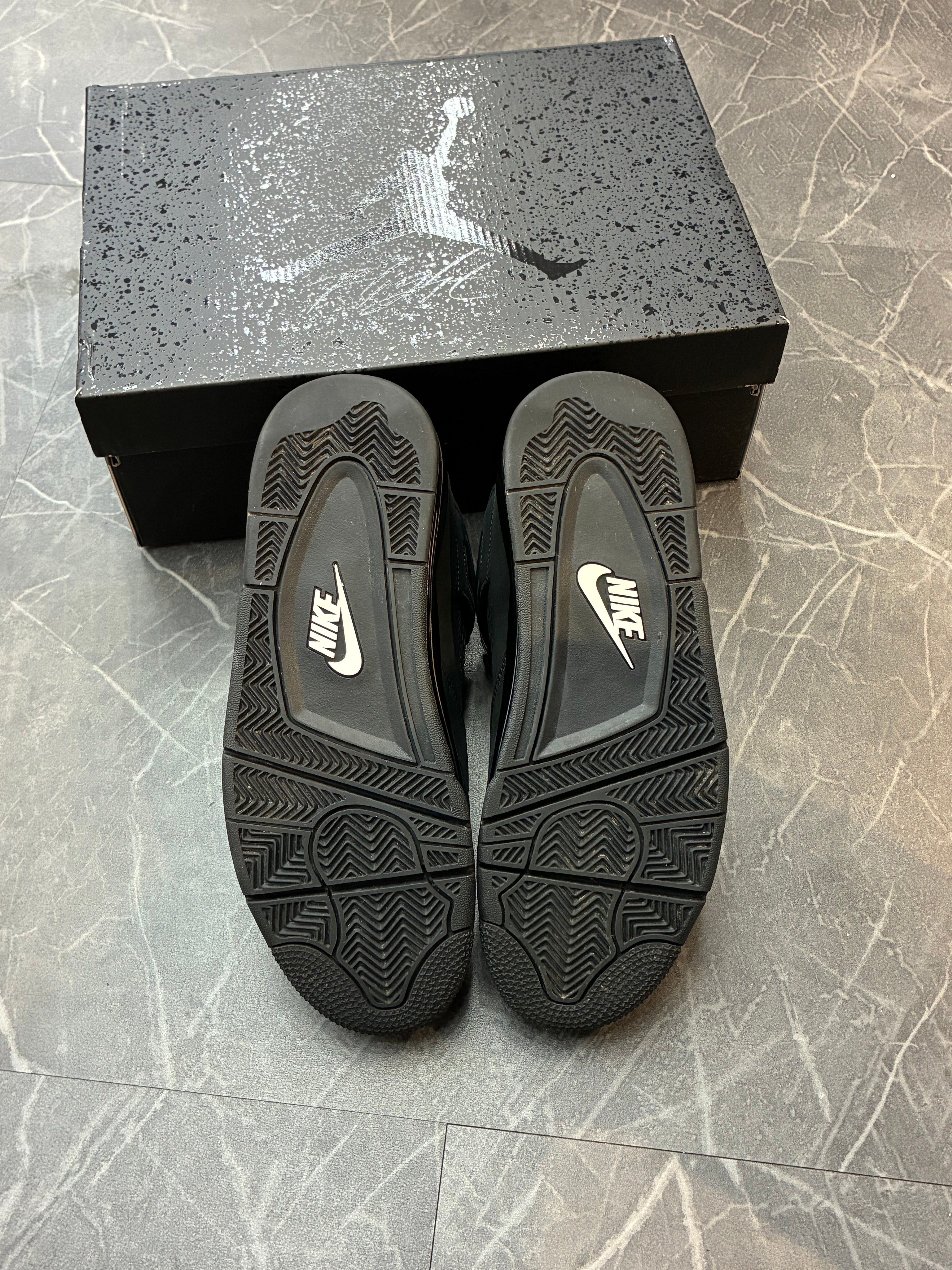 Jordan 4 “Black Cat” (2025)