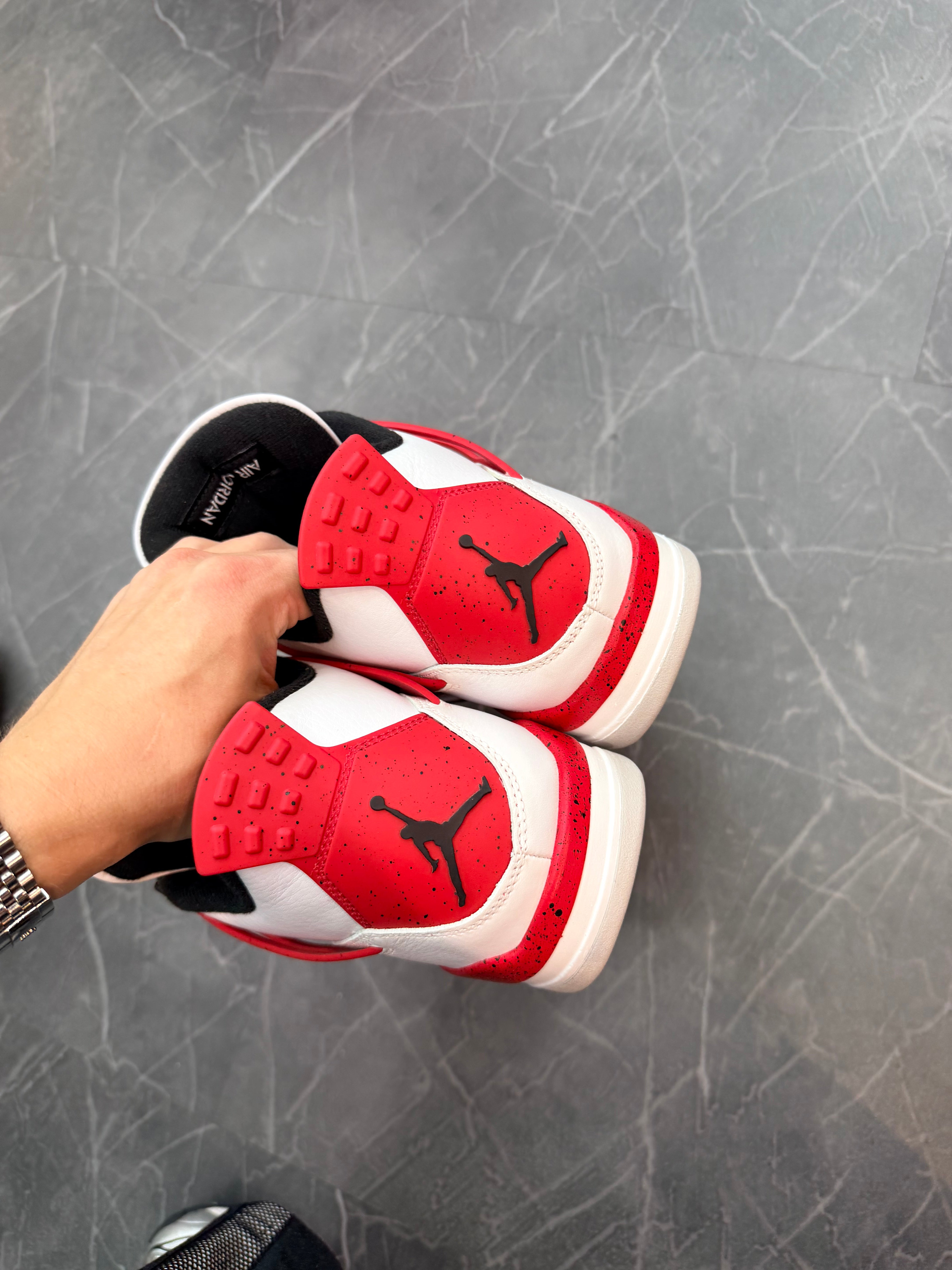 Jordan 4 “Red Cement”
