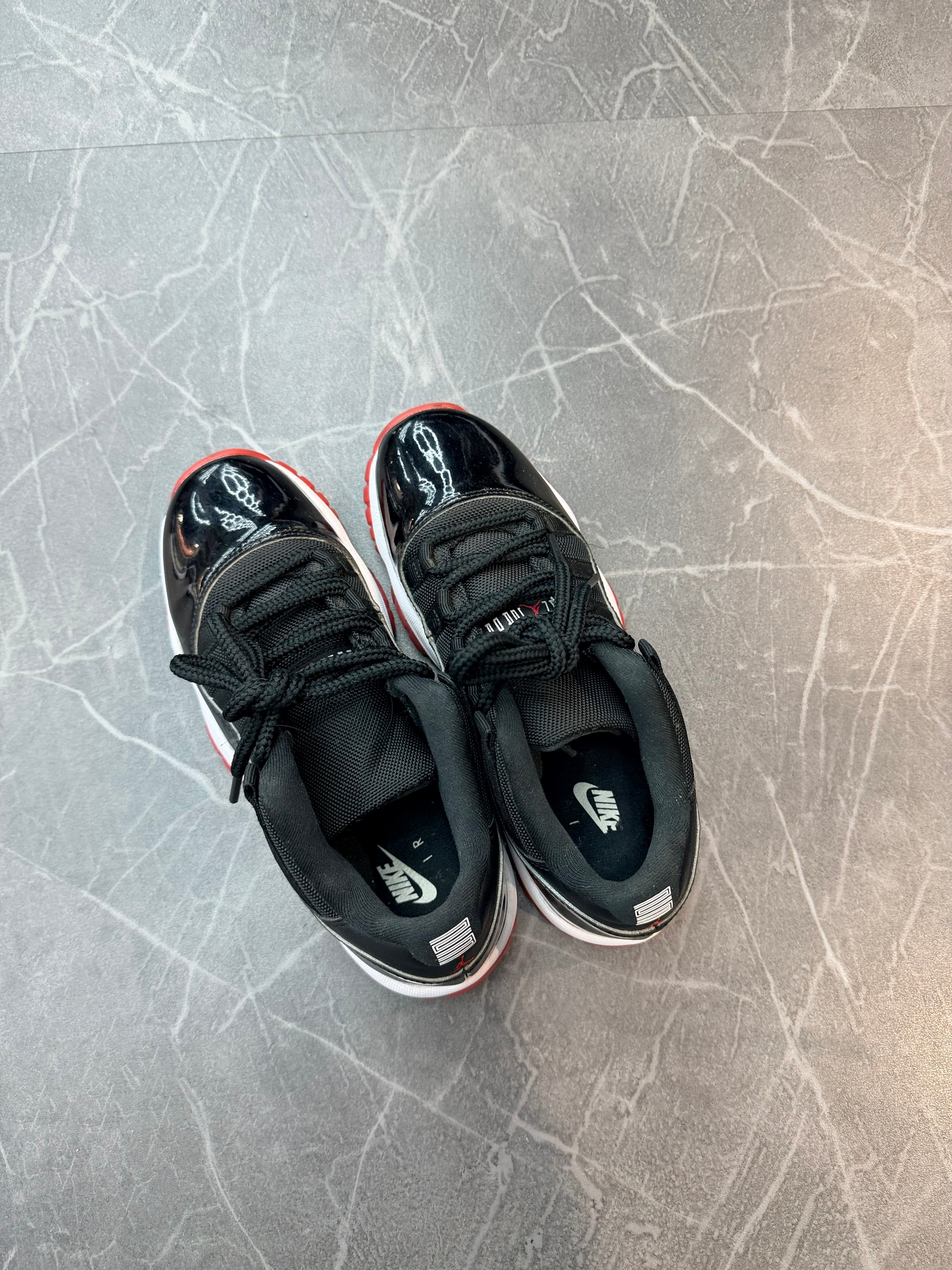 Jordan 11 Low “Bred”