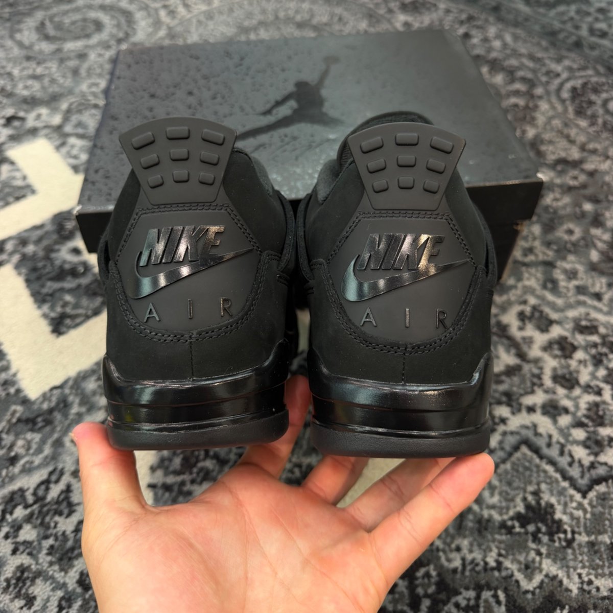 Jordan 4 Retro Black Cat (2025) - tag
