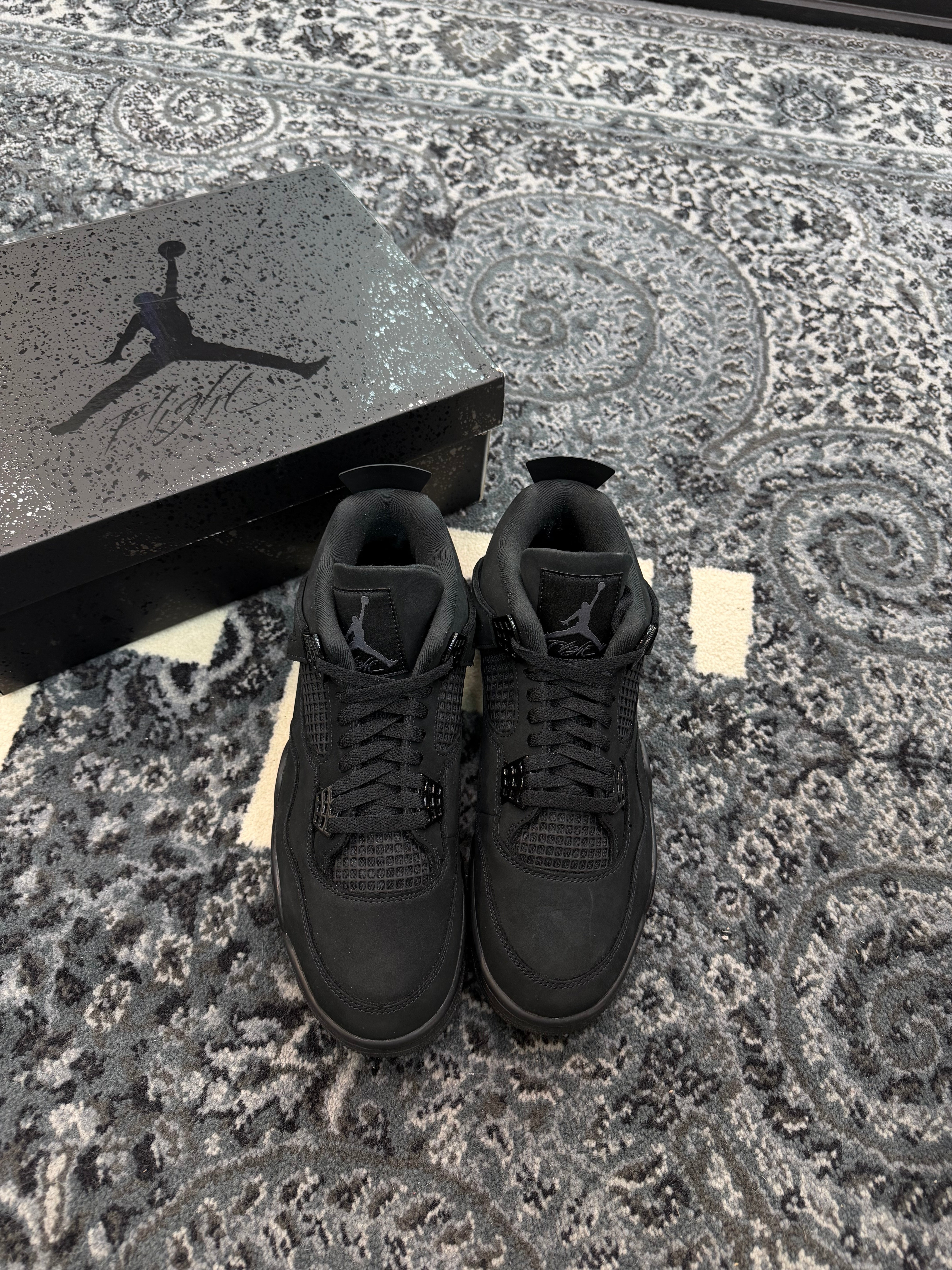 Jordan 4 “Black Cat” (2025)