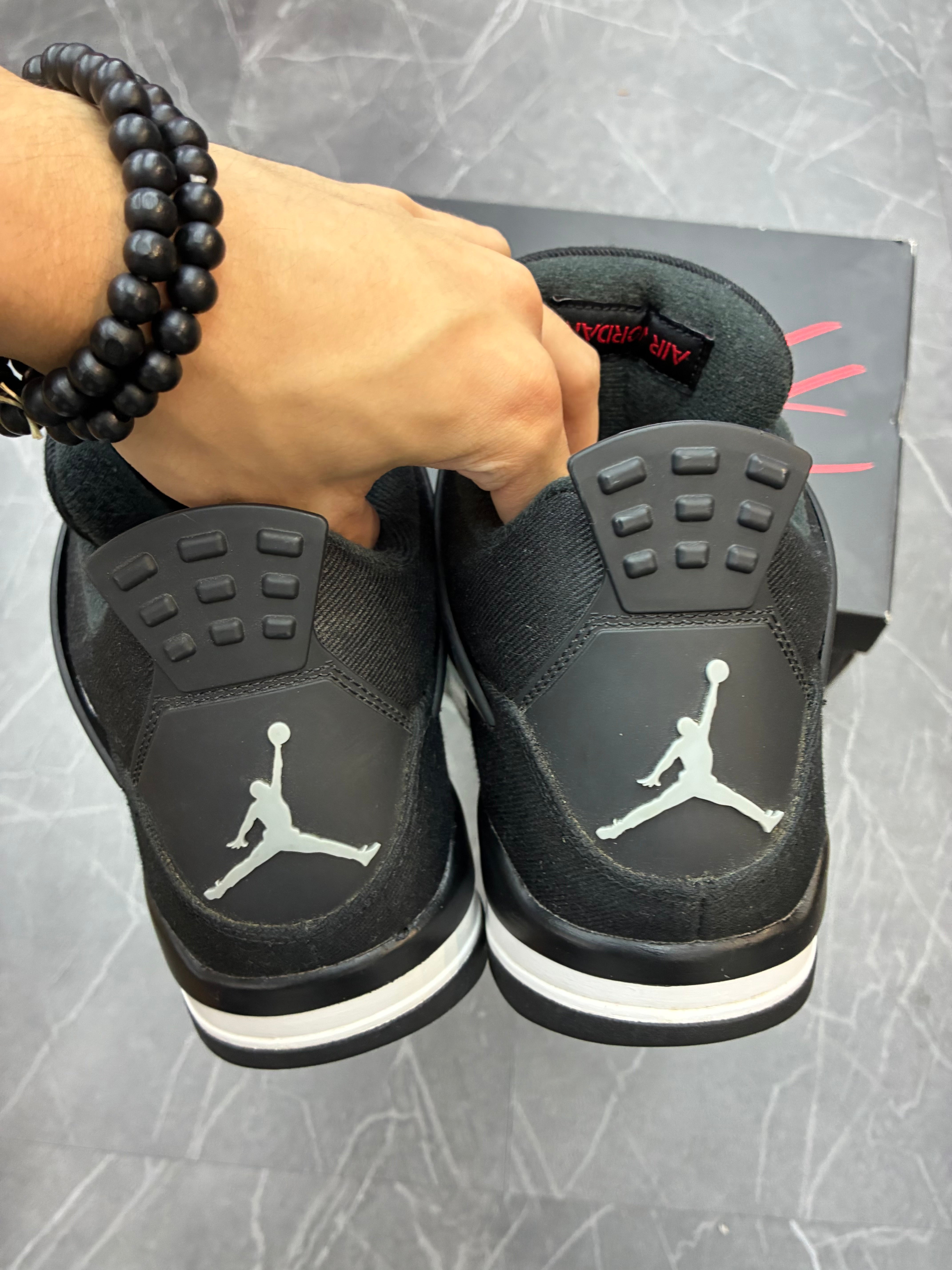 Jordan 4 “Black Canvas”