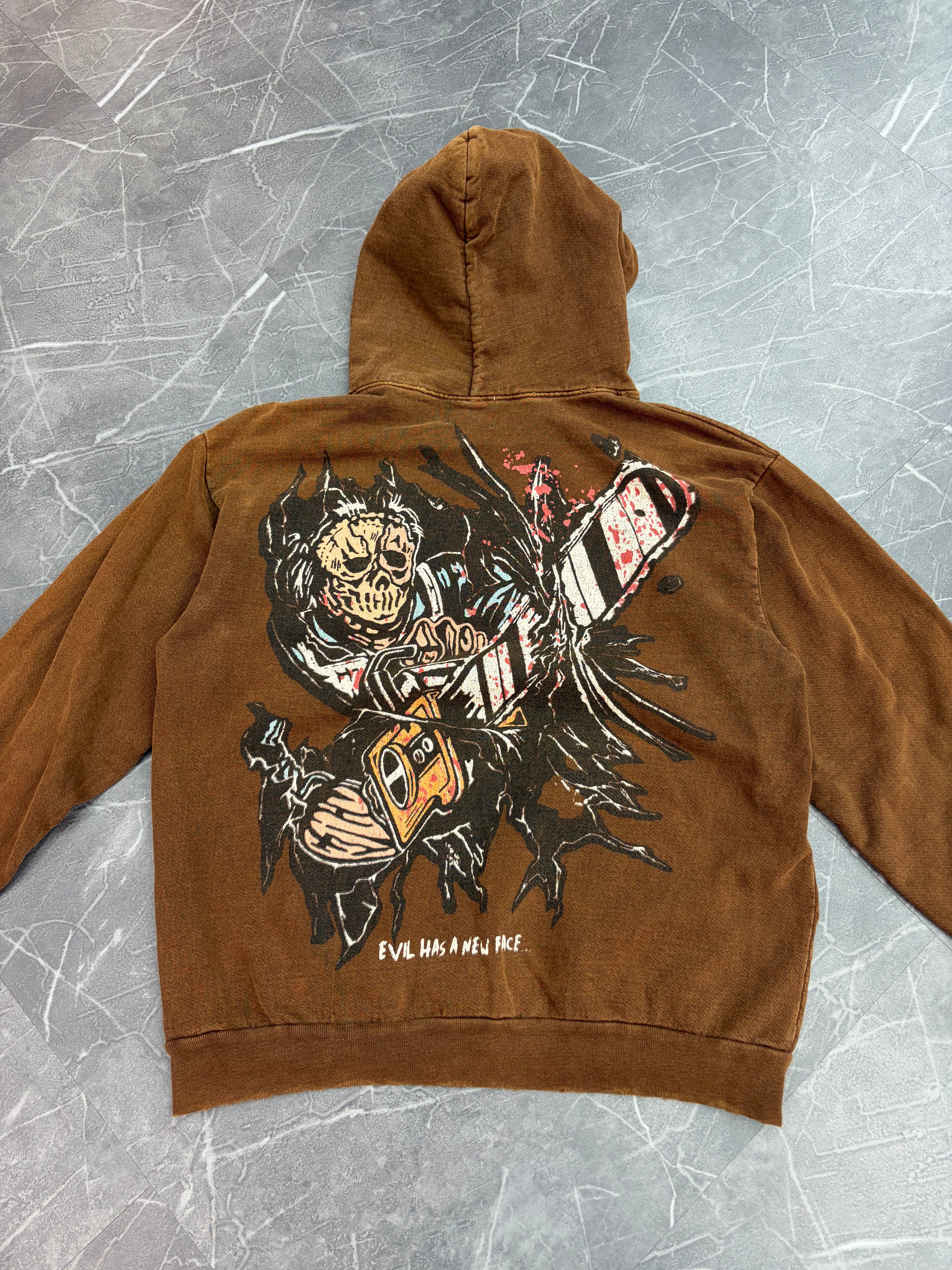Warren Lotas Evil Has A New Face Hoodie “Brown”
