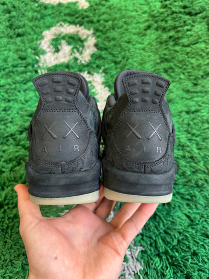 Jordan 4 x Kaws “Black”
