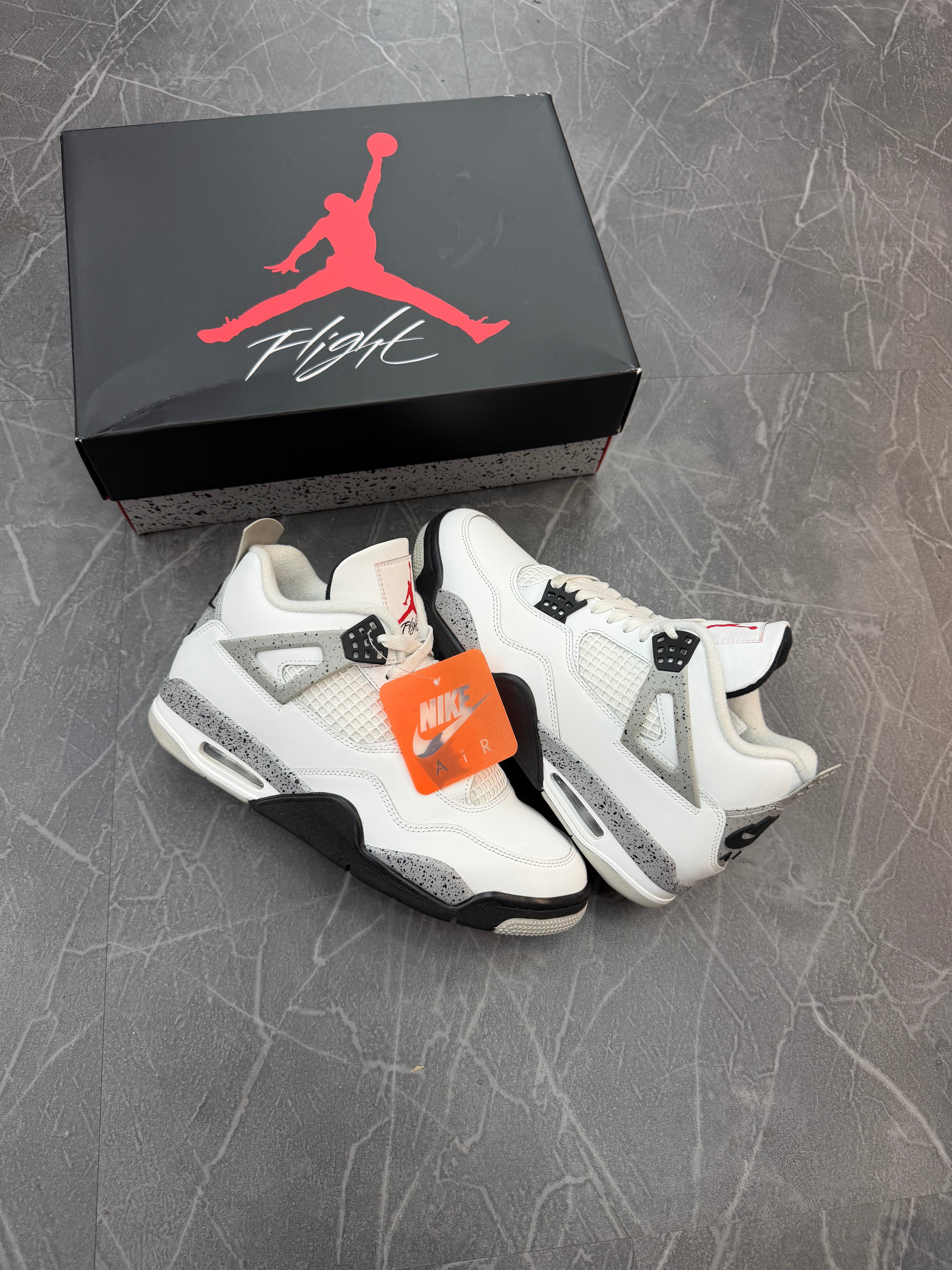 Jordan 4 “White Cement”