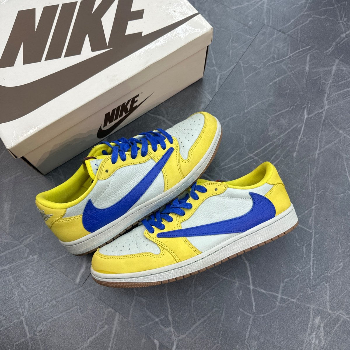 Jordan 1 Retro Low OG SP Travis Scott Canary (Women's) - Image 1