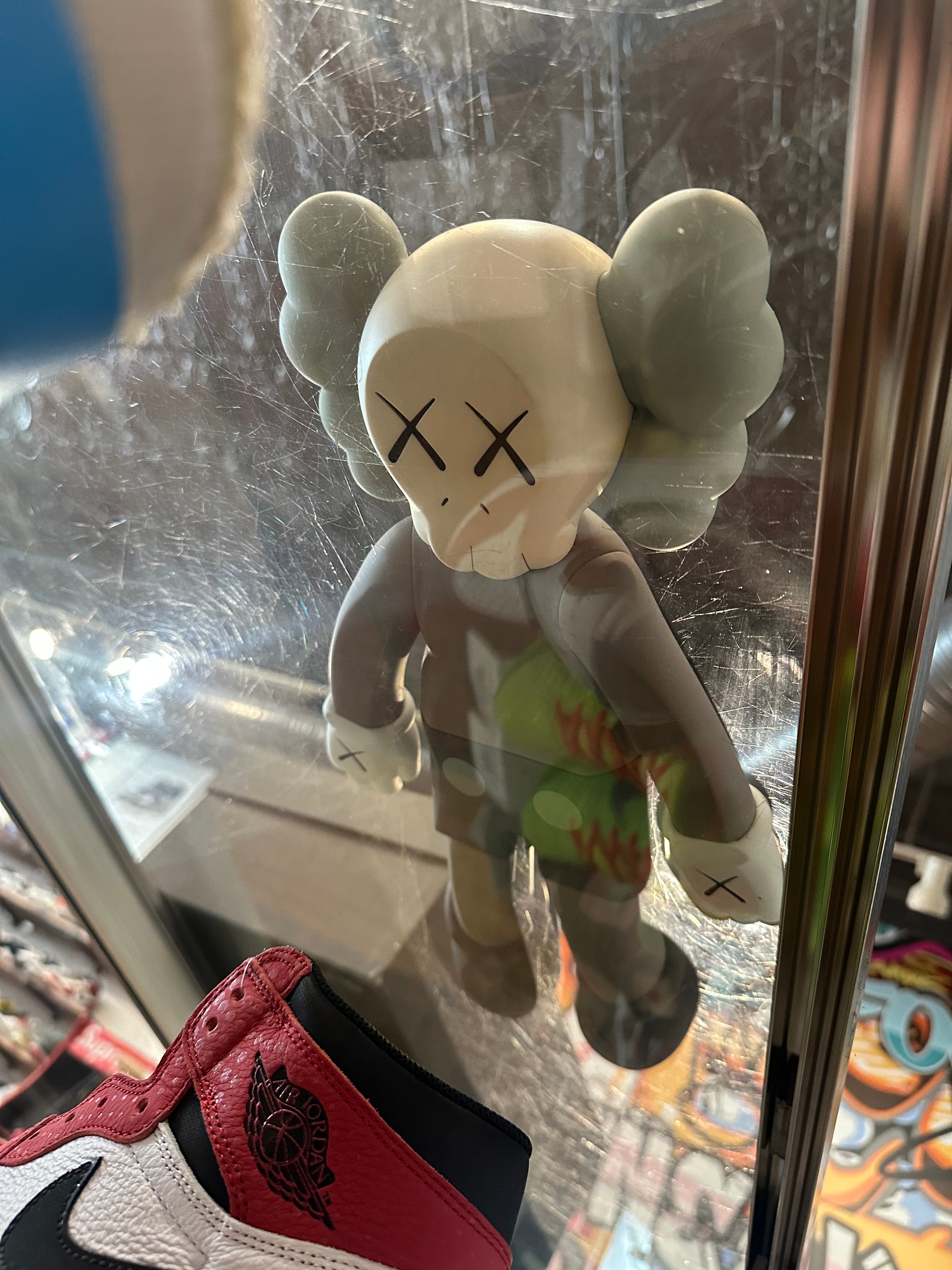 KAWS 2020 Vinyl Figure “Laying Down Brown”
