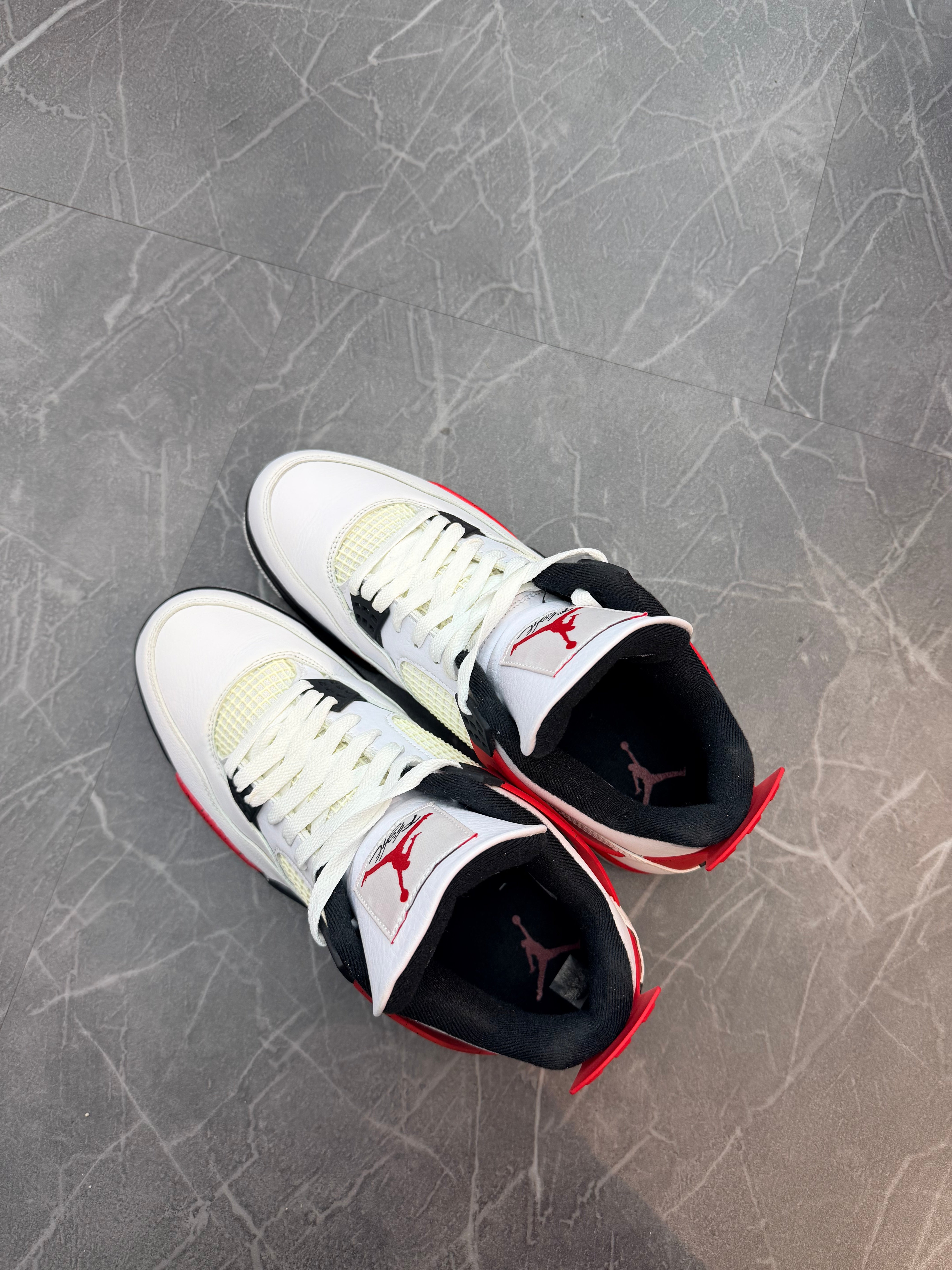 Jordan 4 “Red Cement”