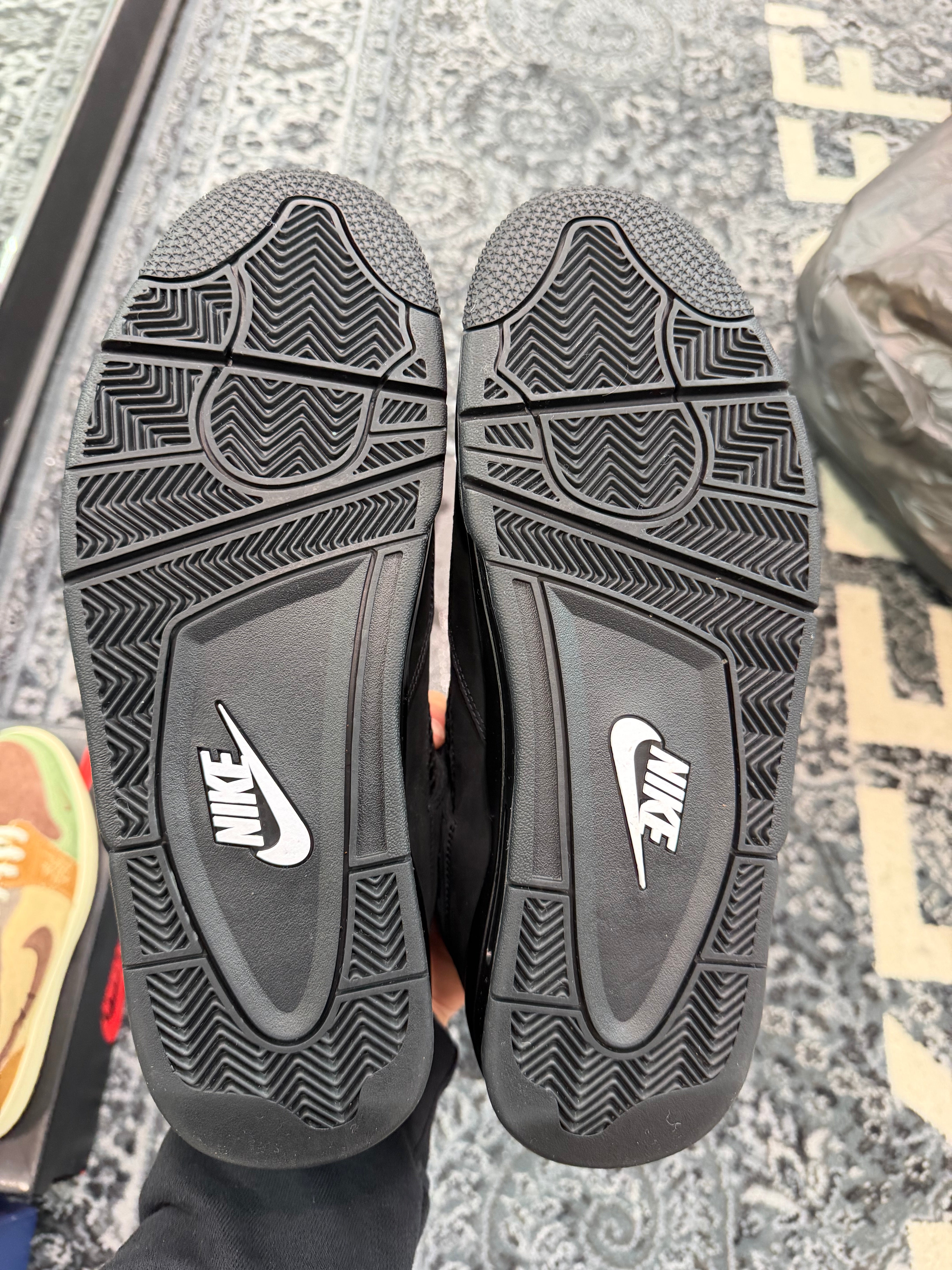 Jordan 4 “Black Cat” (2025)