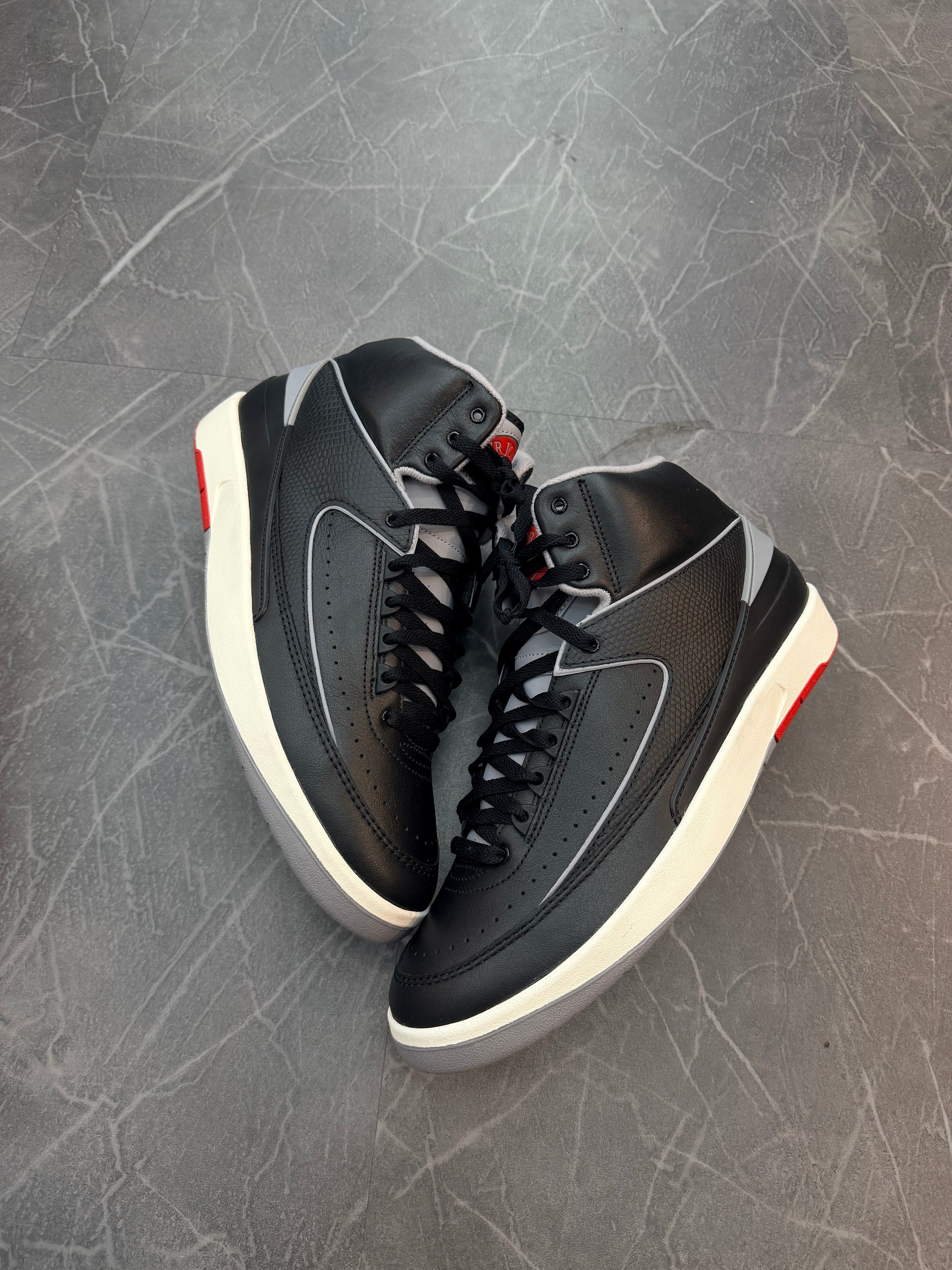 Jordan 2 “Black Cement”
