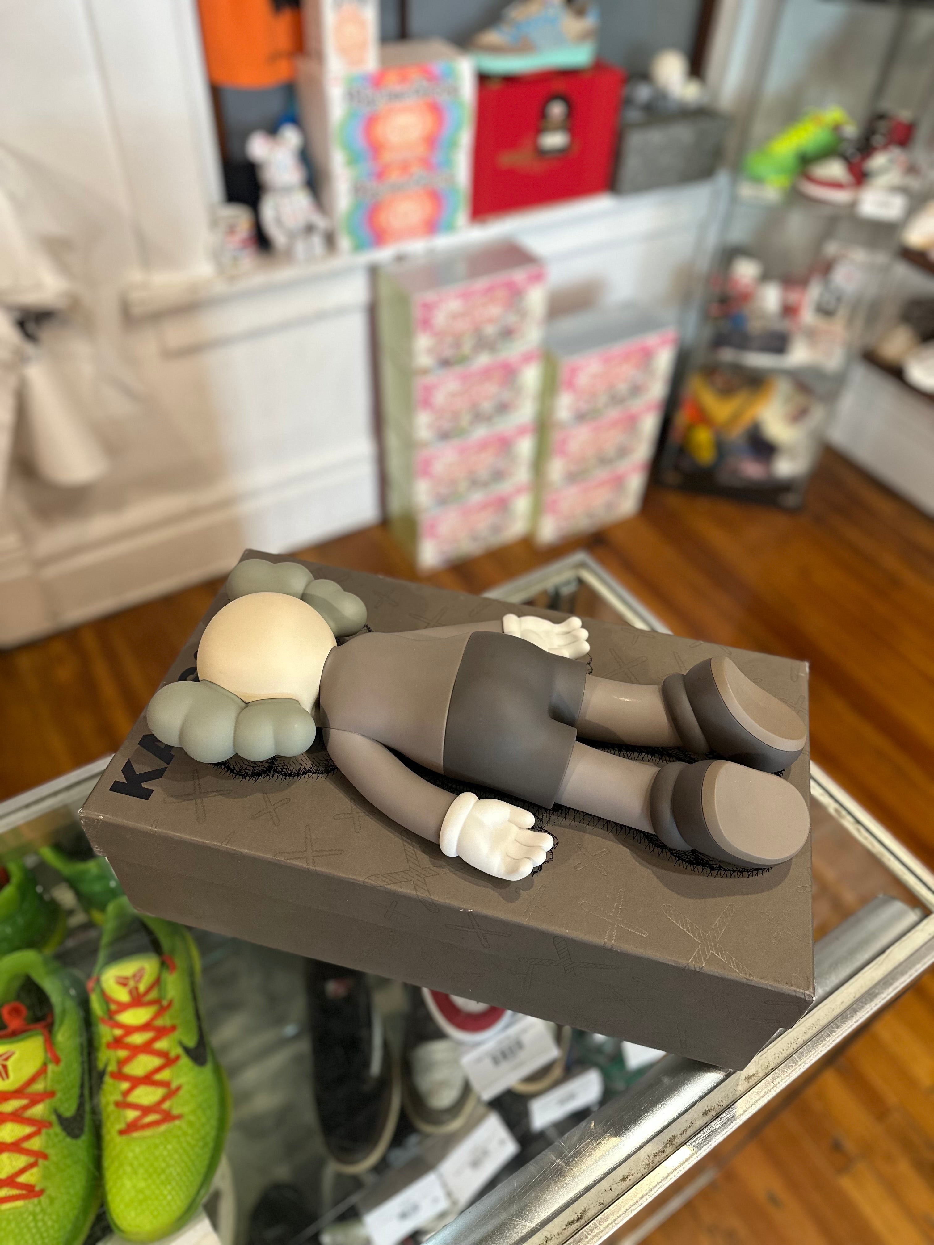 KAWS 2020 Vinyl Figure “Laying Down Brown”