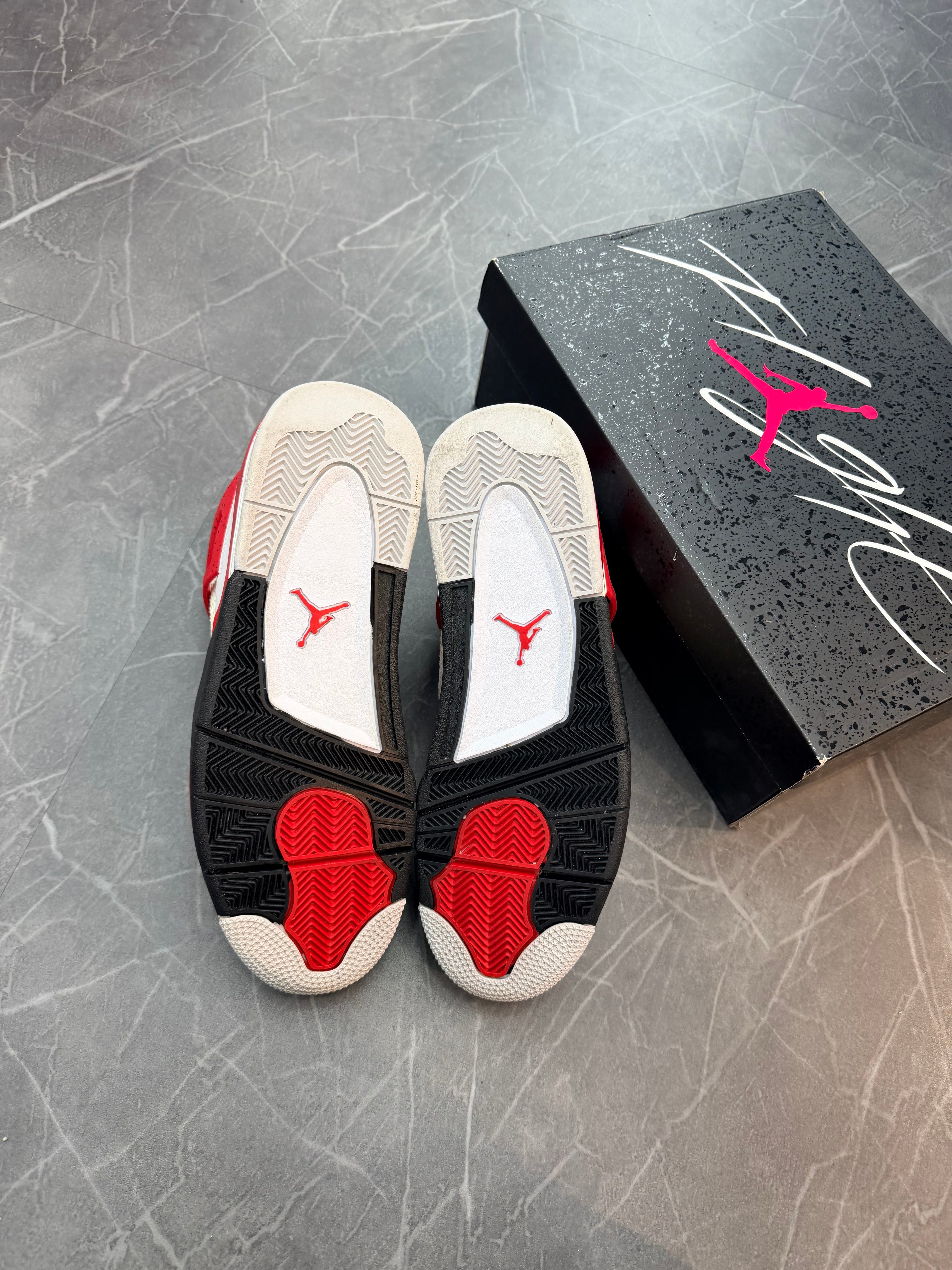 Jordan 4 “Red Cement”
